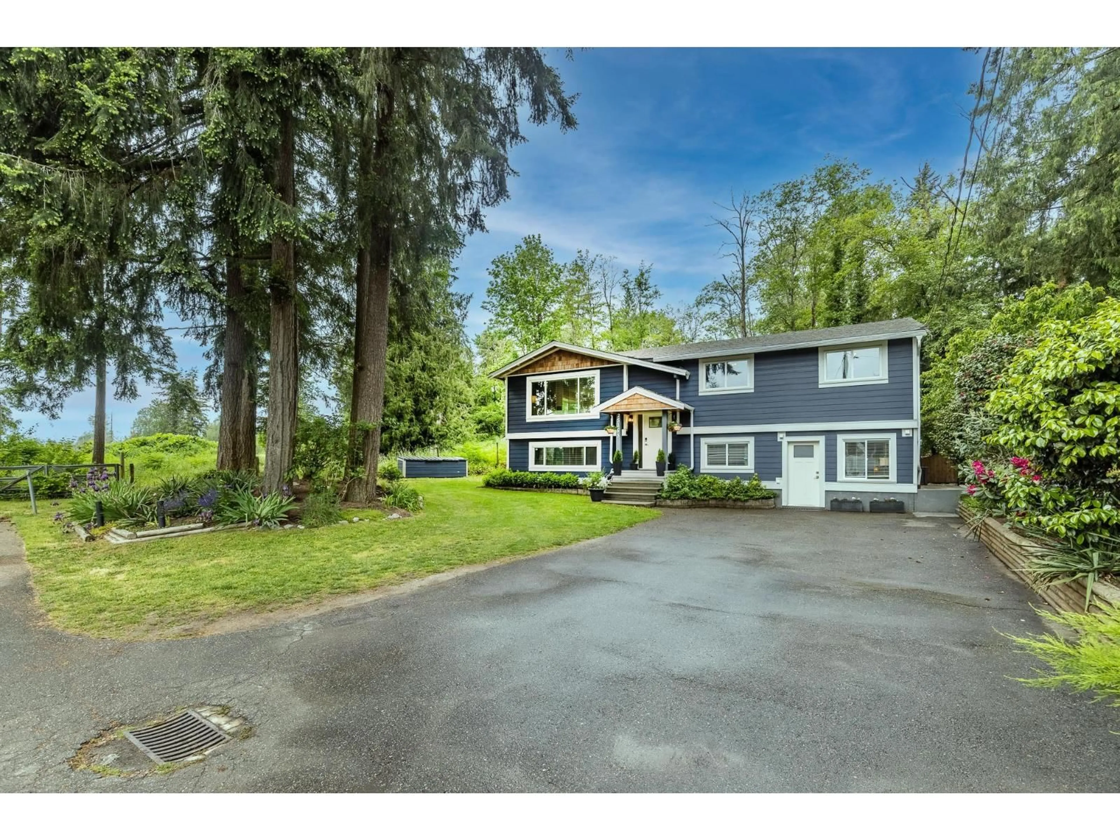A pic from outside/outdoor area/front of a property/back of a property/a pic from drone, street for 25153 11B, Langley British Columbia V4W2S7
