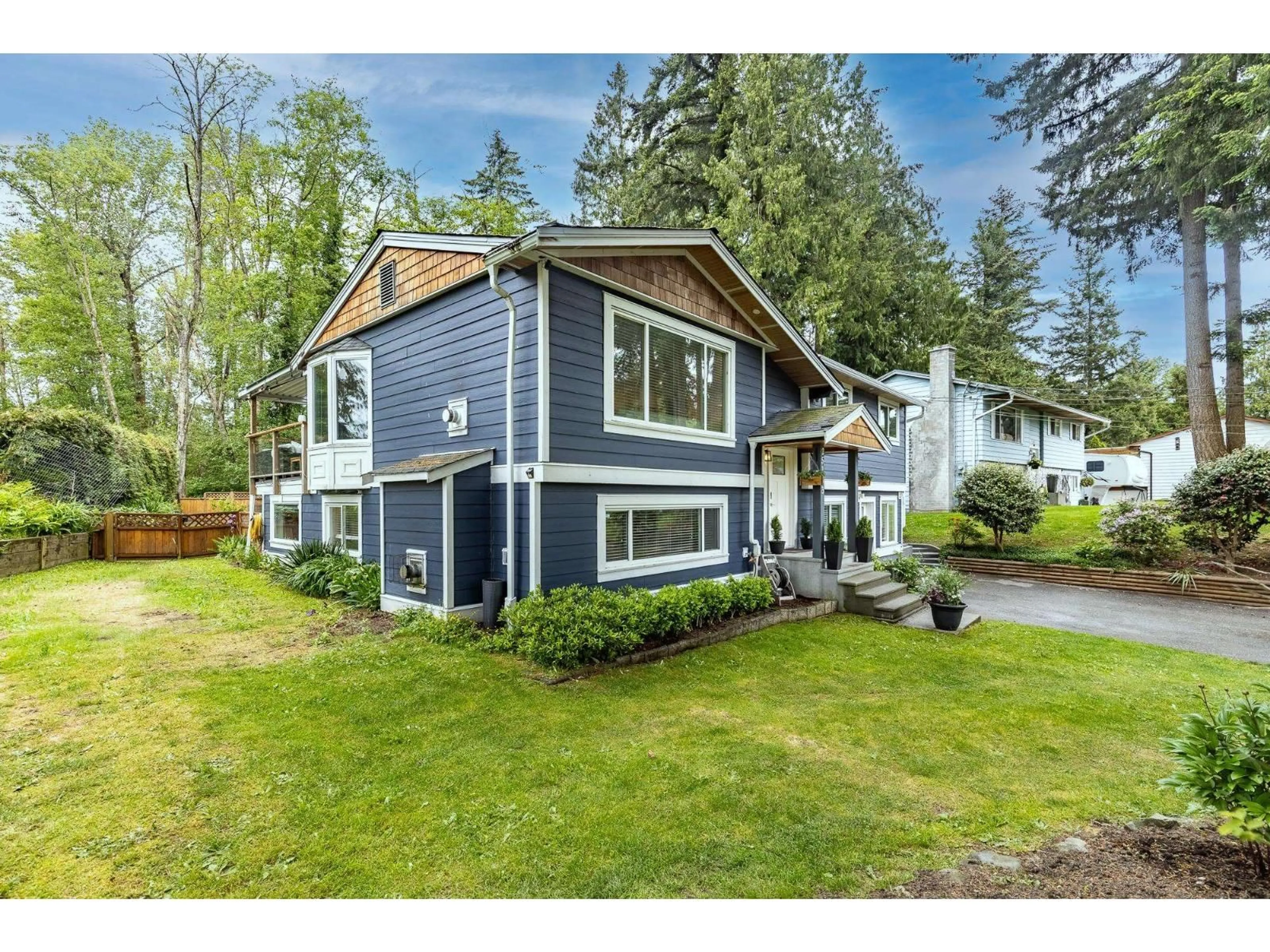 Home with vinyl exterior material, street for 25153 11B, Langley British Columbia V4W2S7