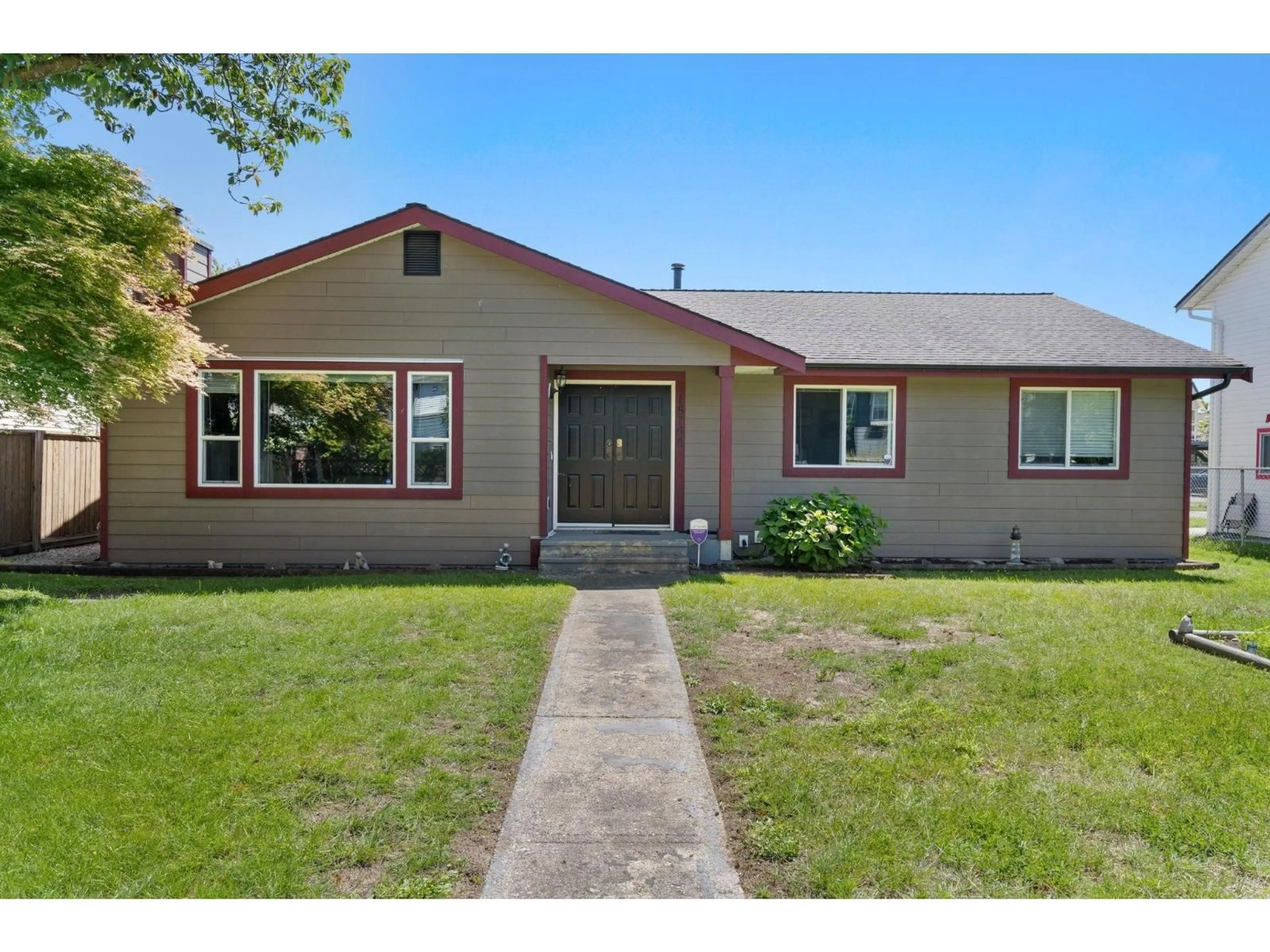 Home with vinyl exterior material, street for 18768 64, Surrey British Columbia V3S7T9