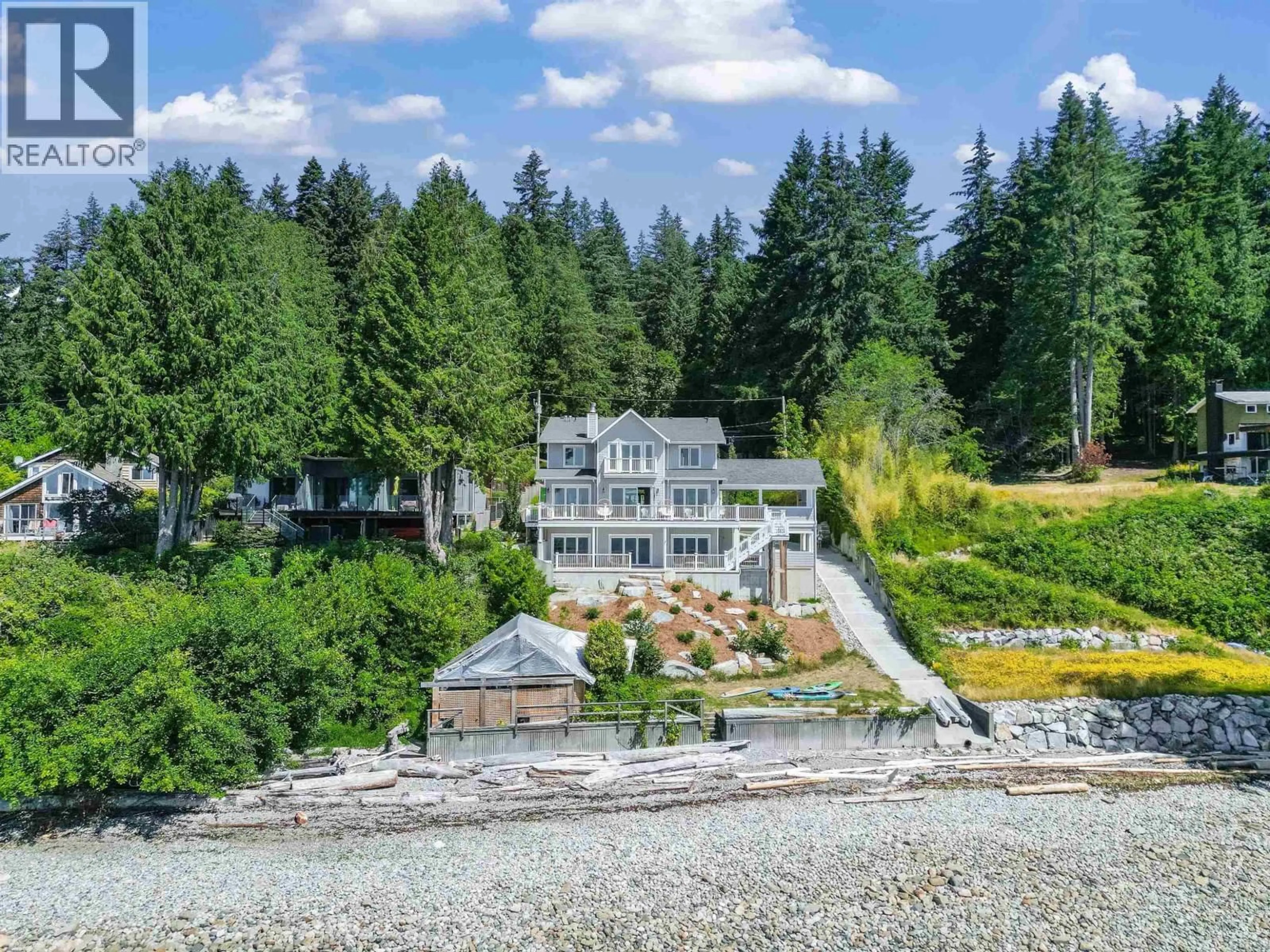 A pic from outside/outdoor area/front of a property/back of a property/a pic from drone, water/lake/river/ocean view for 2585 LOWER ROAD, Roberts Creek British Columbia V0N2W4