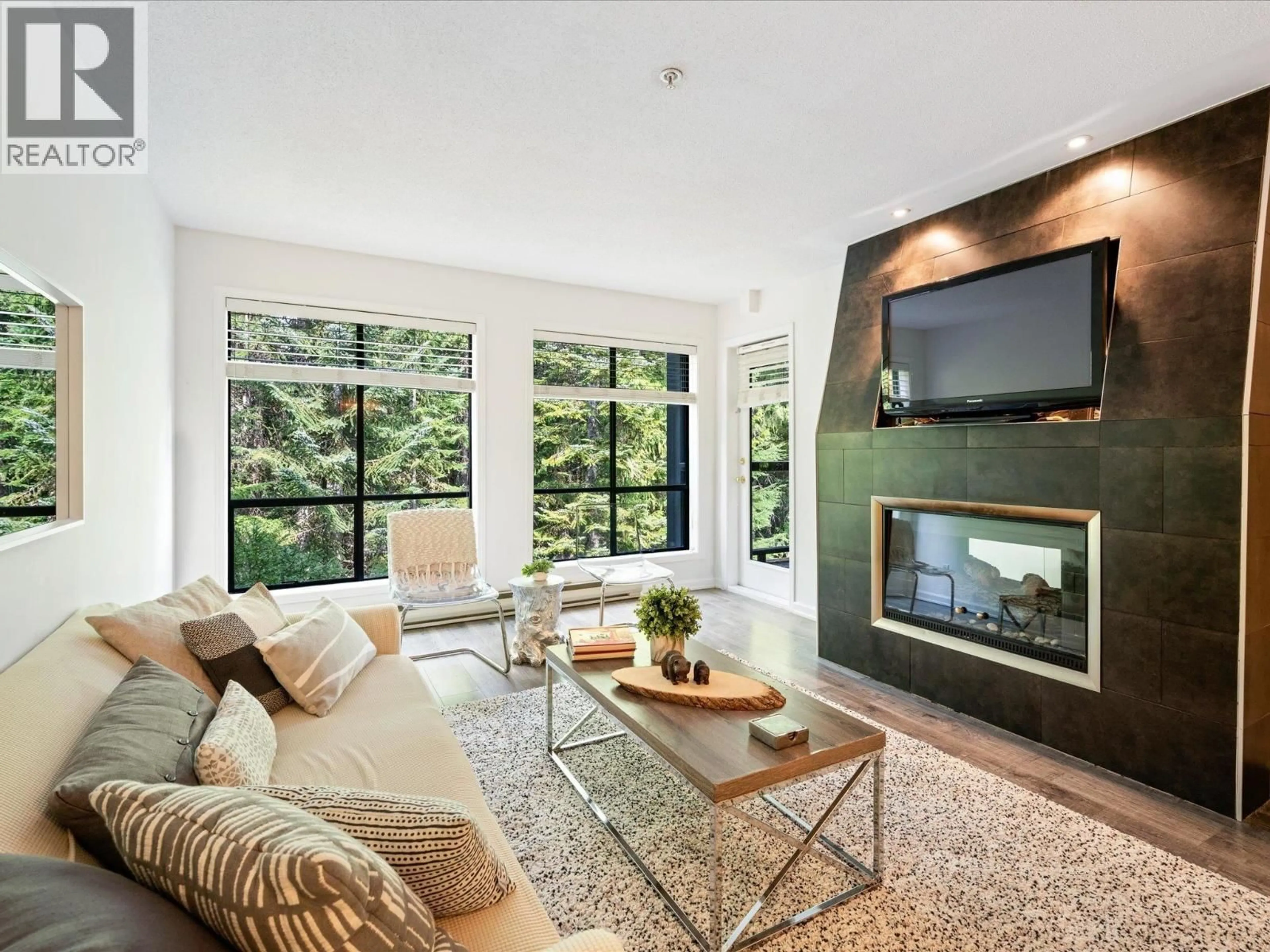 Living room with furniture, unknown for 201 - 4821 SPEARHEAD DRIVE, Whistler British Columbia V8E1E8