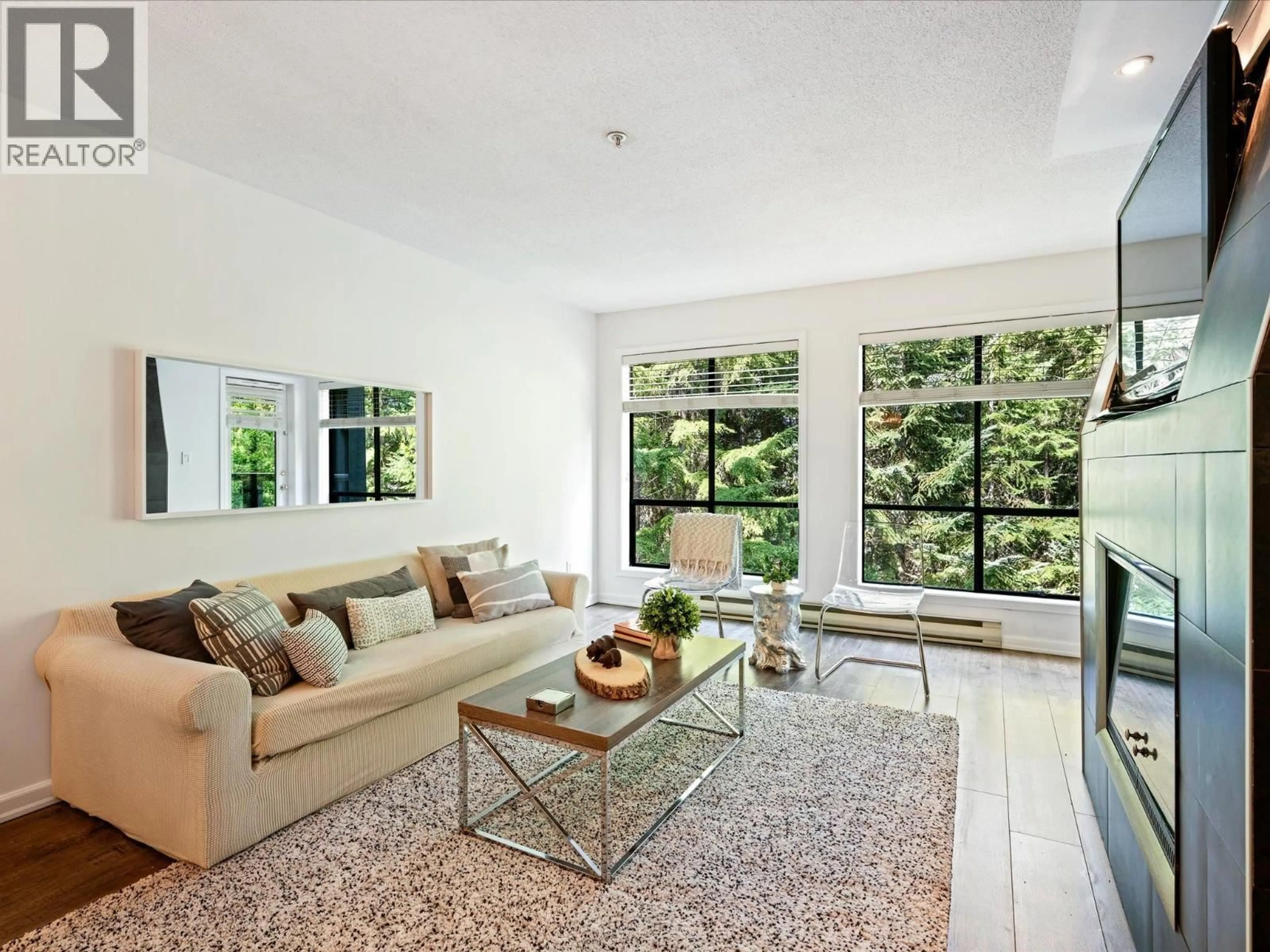 Living room with furniture, unknown for 201 - 4821 SPEARHEAD DRIVE, Whistler British Columbia V8E1E8