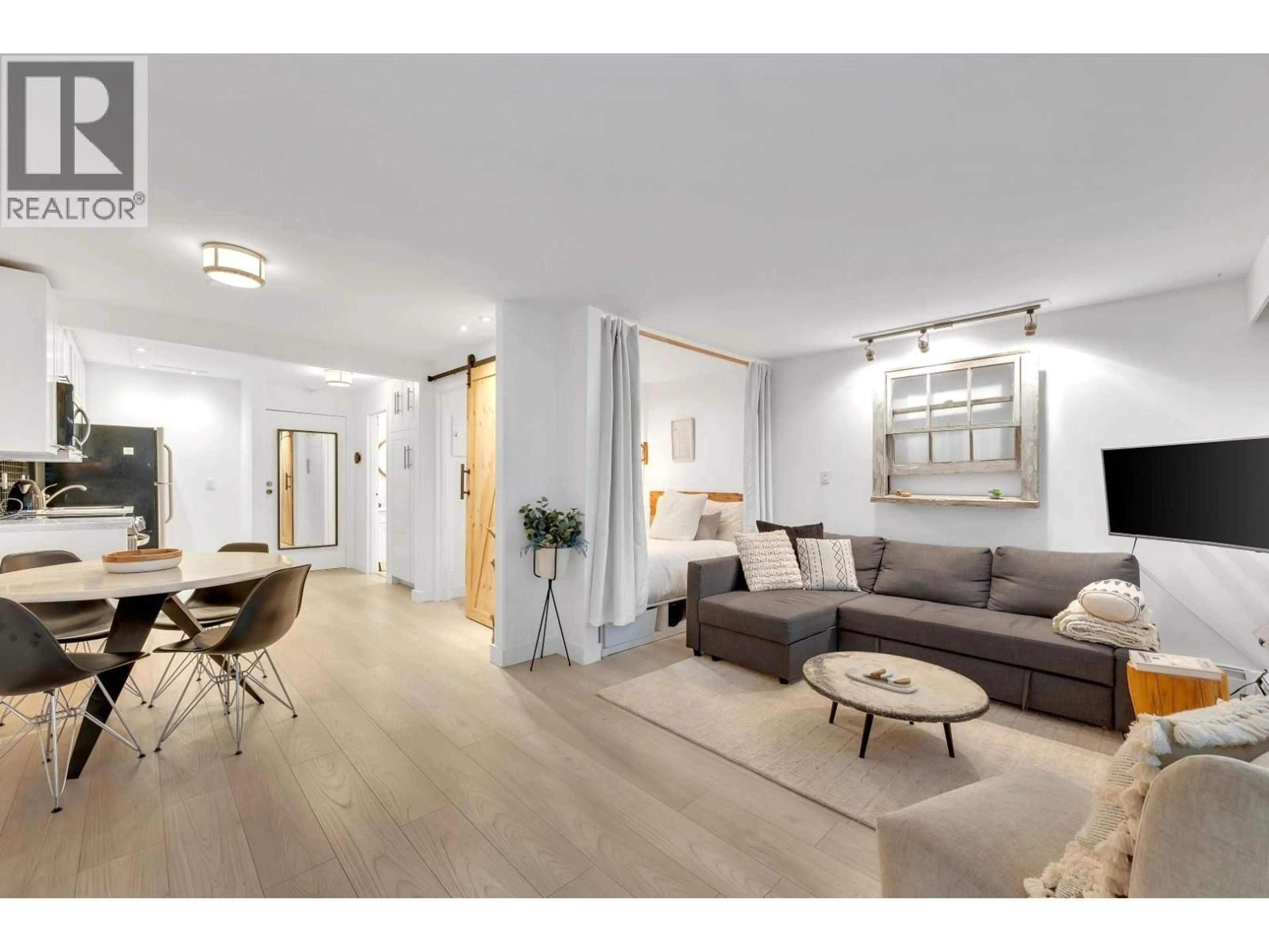 Living room with furniture, unknown for 111 - 2190 7 AVENUE, Vancouver British Columbia V6K4K7