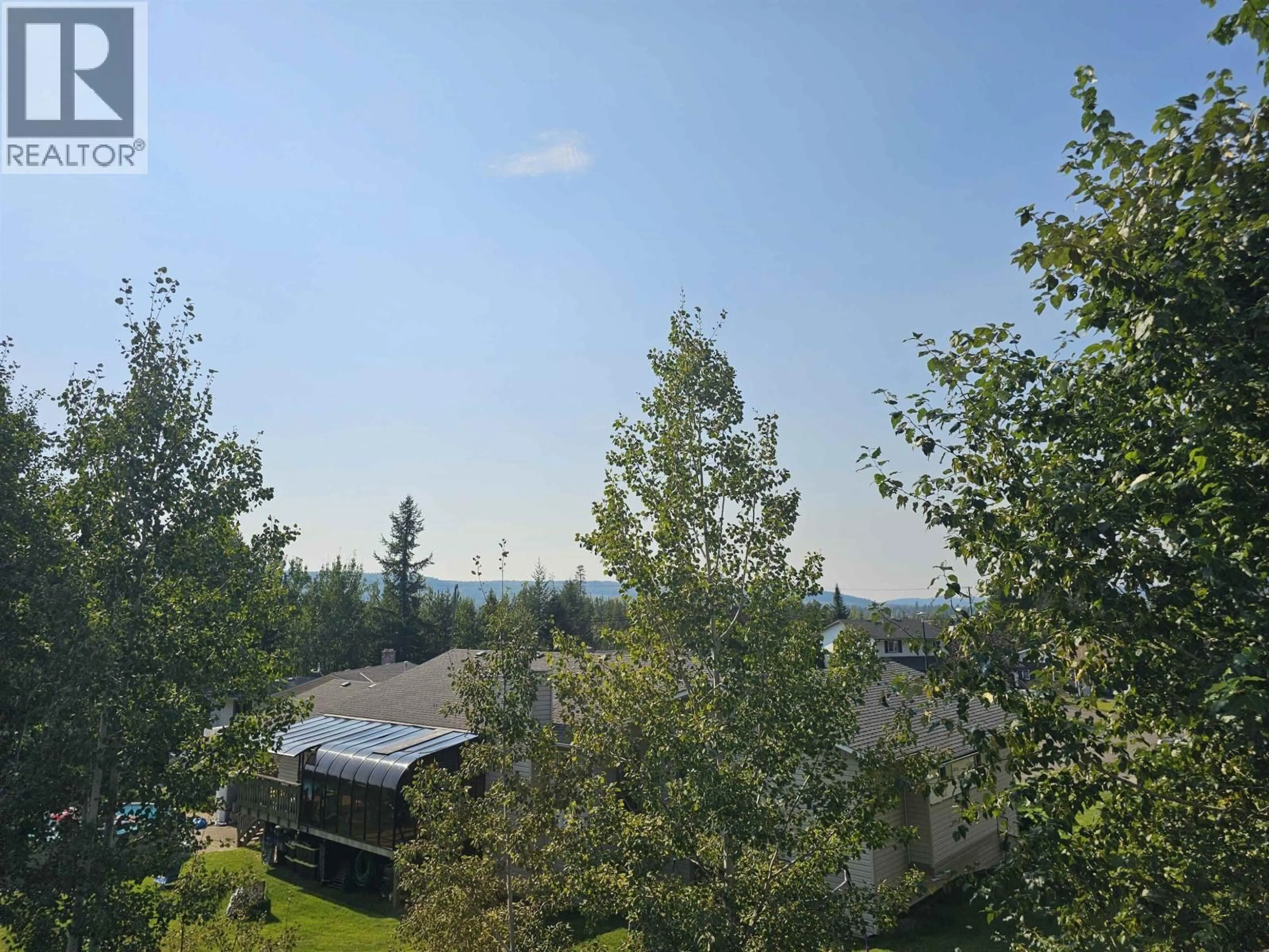 A pic from outside/outdoor area/front of a property/back of a property/a pic from drone, forest/trees view for 4631 AVTAR PLACE, Prince George British Columbia V2K0A9