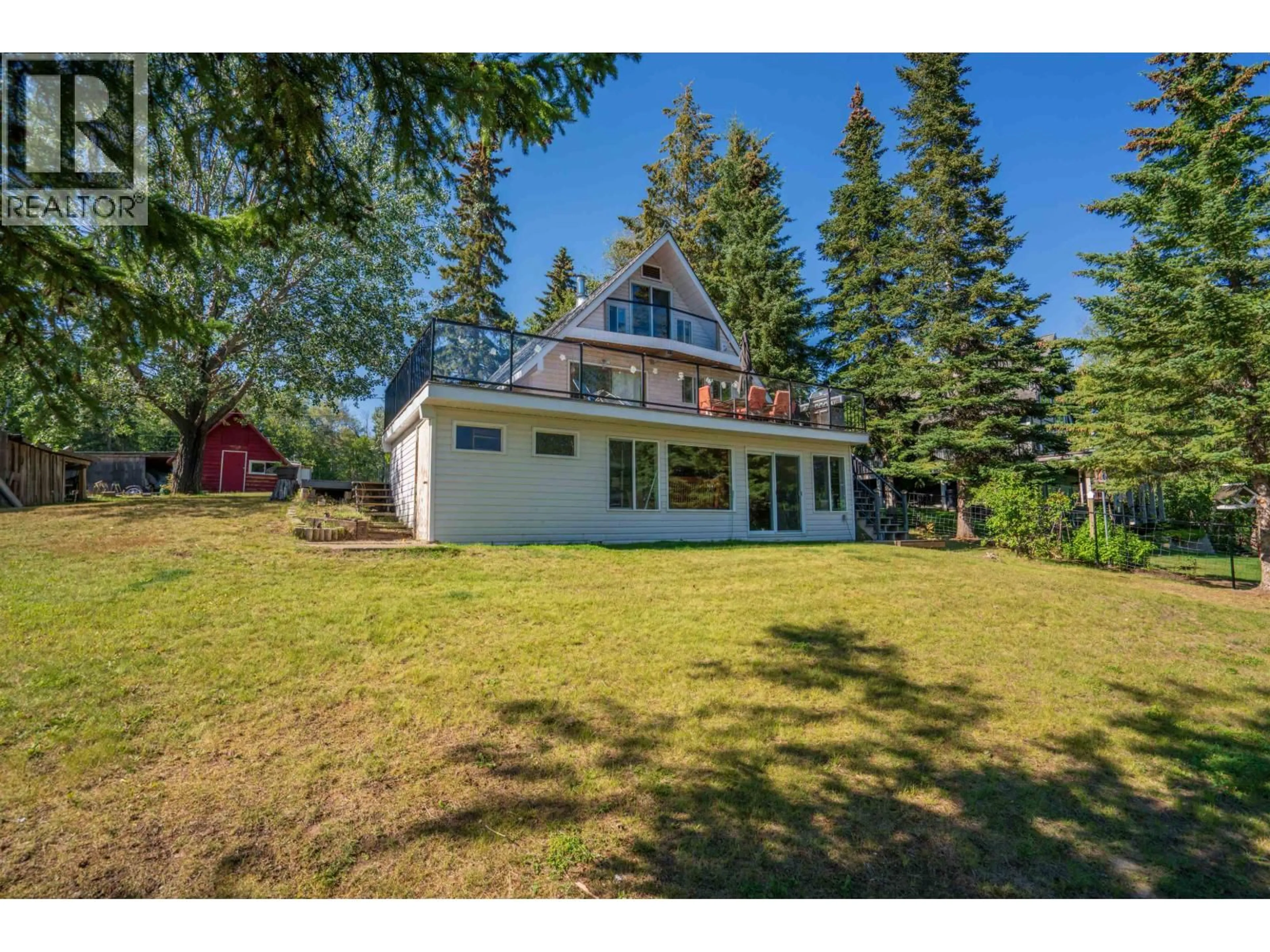 A pic from outside/outdoor area/front of a property/back of a property/a pic from drone, water/lake/river/ocean view for 25685 NESS LAKE ROAD, Prince George British Columbia V2K5N3