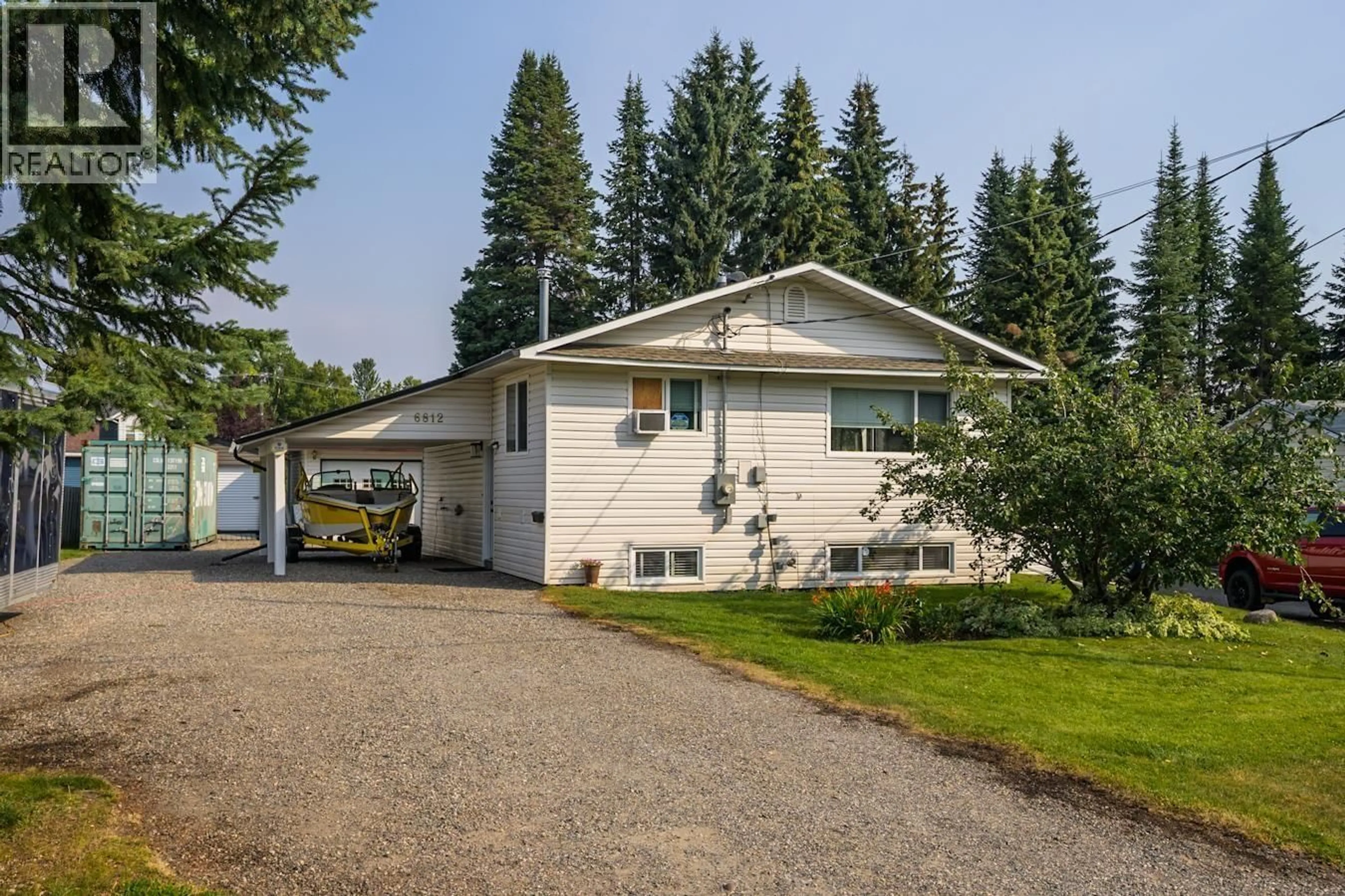 Home with vinyl exterior material, street for 6812 LILAC CRESCENT, Prince George British Columbia V2K3H3