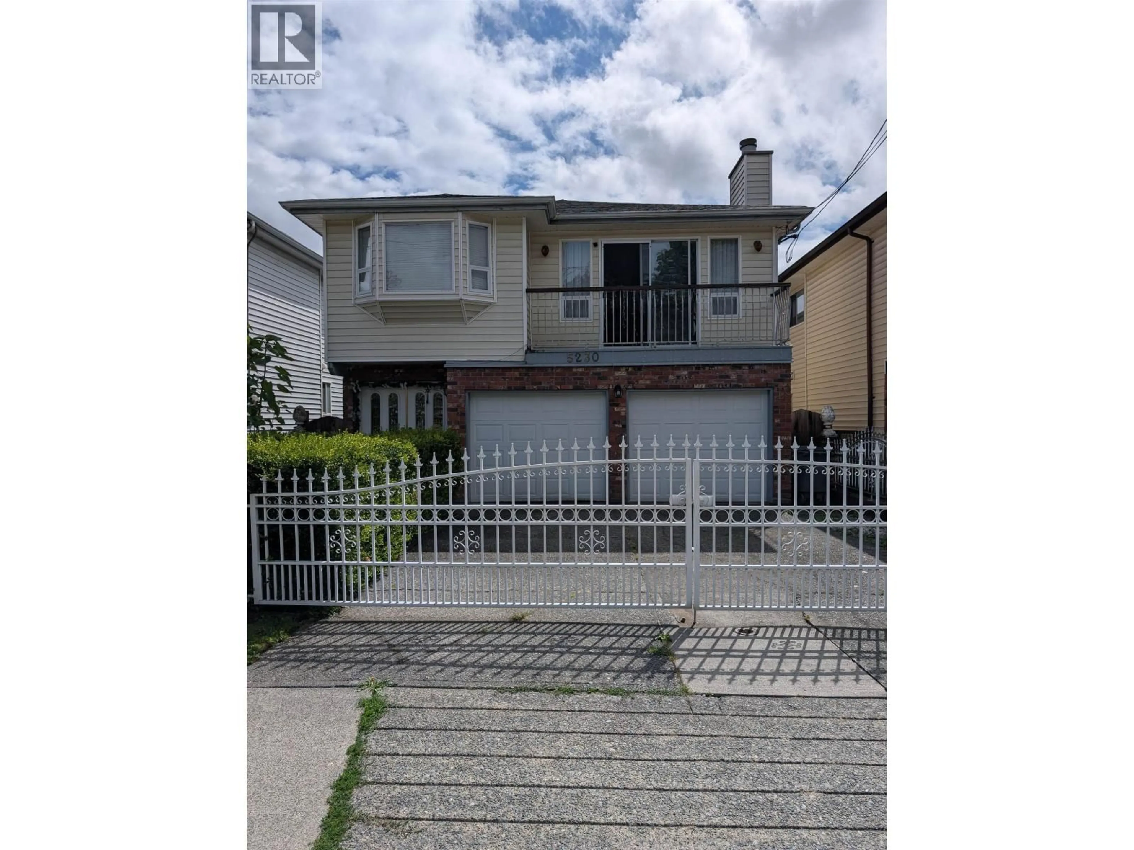A pic from outside/outdoor area/front of a property/back of a property/a pic from drone, street for 5230 MCKINNON STREET, Vancouver British Columbia V5R4C6