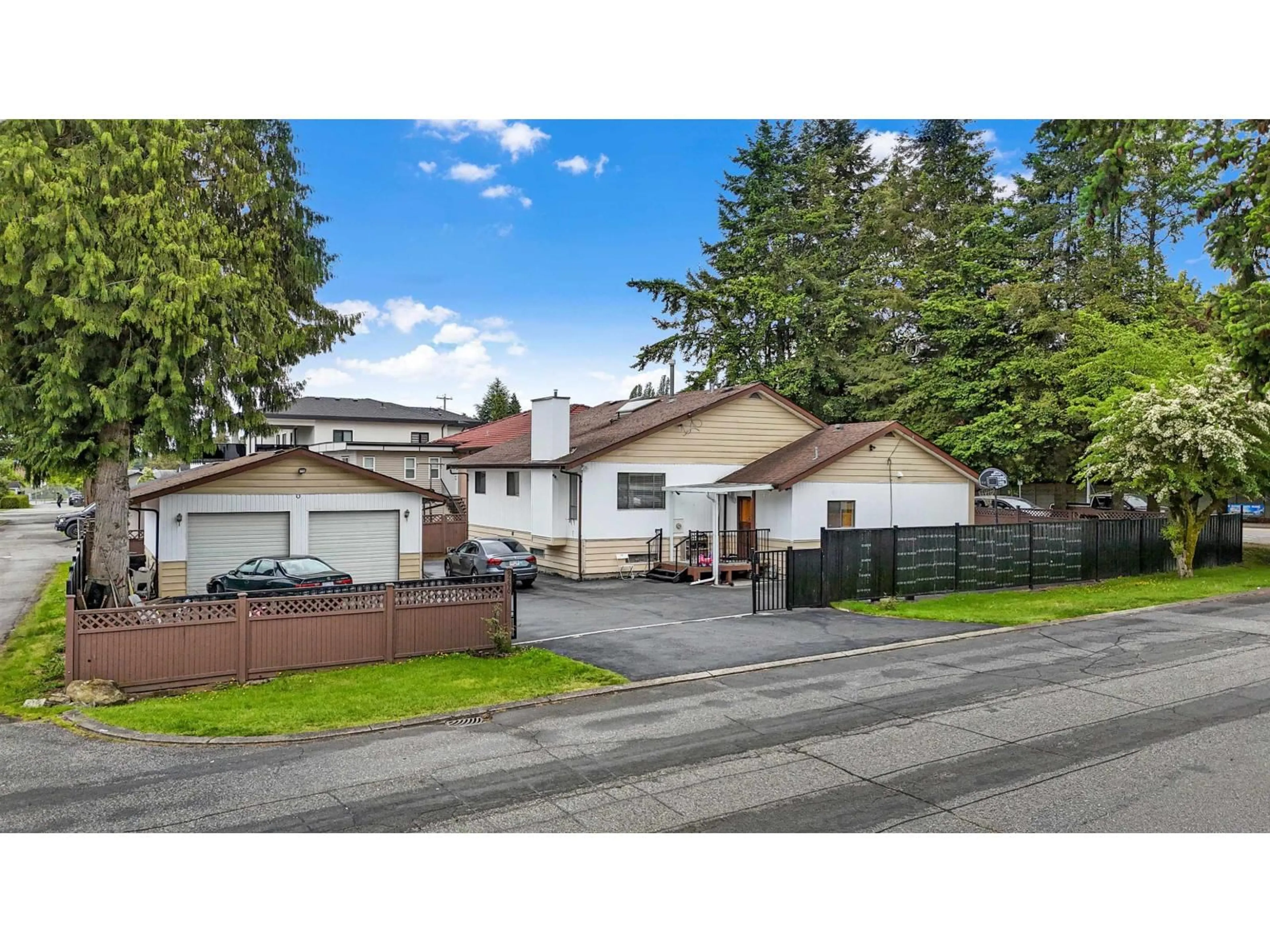 A pic from outside/outdoor area/front of a property/back of a property/a pic from drone, street for 9290 128, Surrey British Columbia V3V5N2