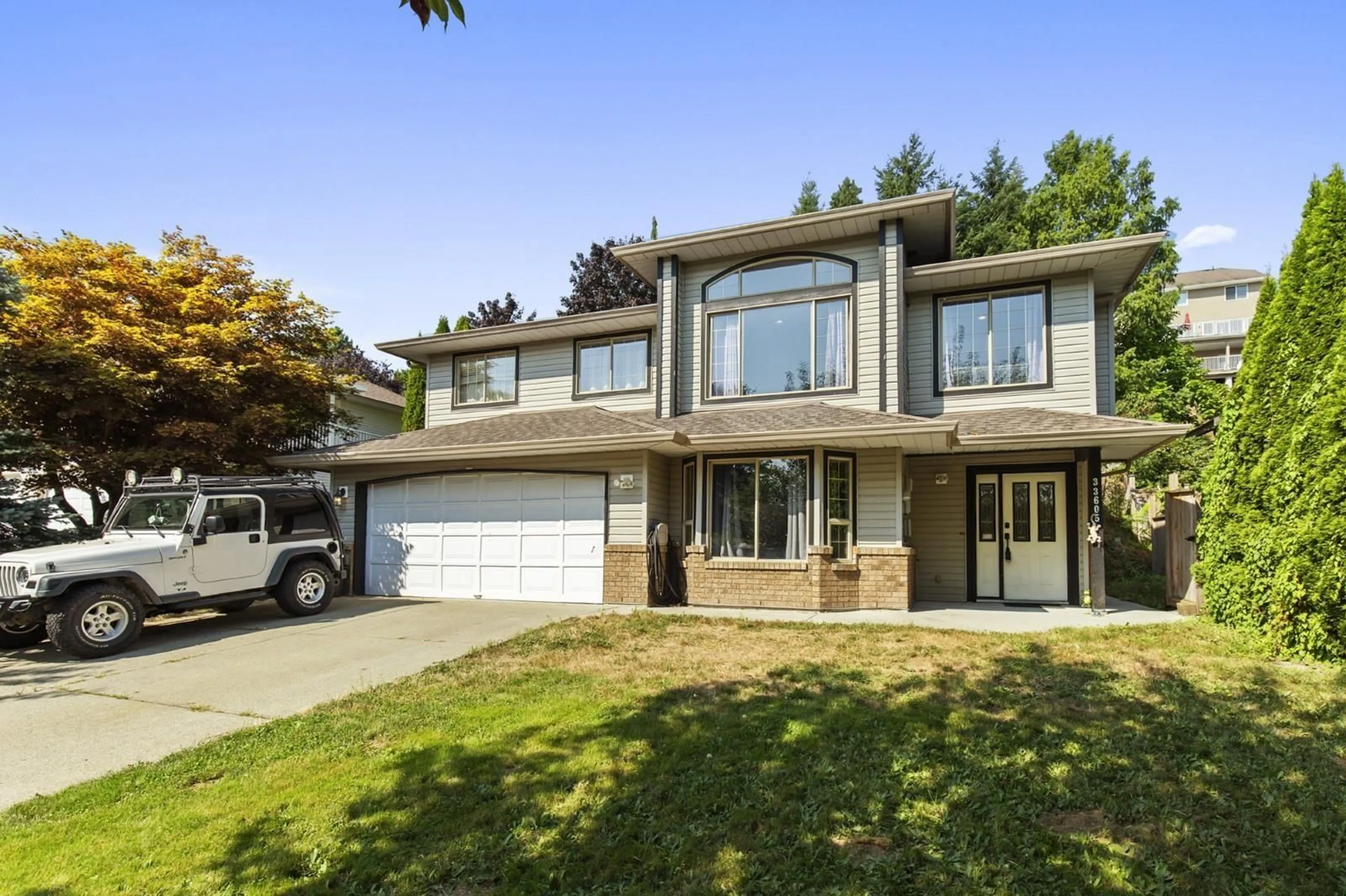Home with vinyl exterior material, street for 33605 BLUEBERRY, Mission British Columbia V2V6Z7