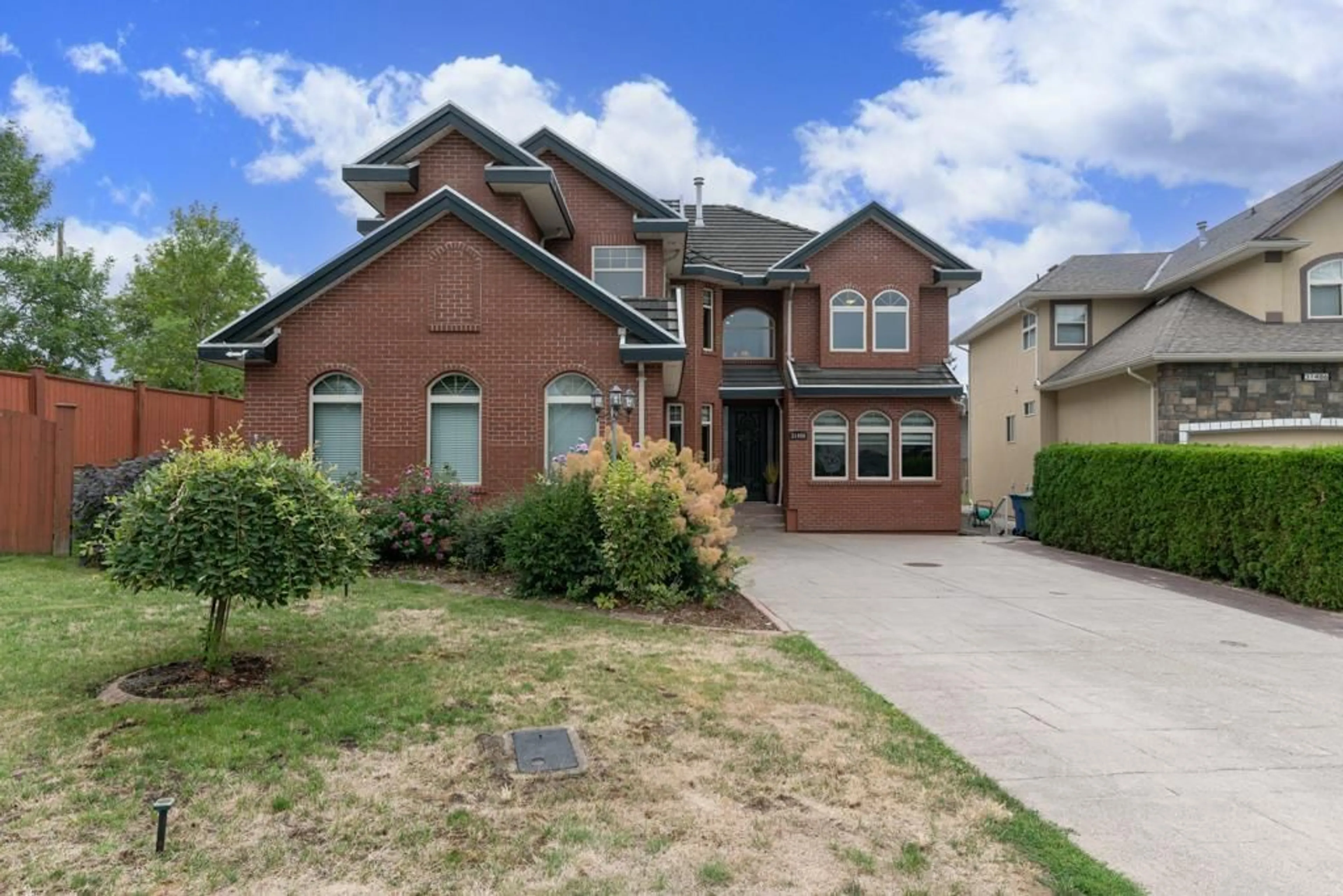 Home with brick exterior material, street for 31496 COUGAR, Abbotsford British Columbia V2T6M7