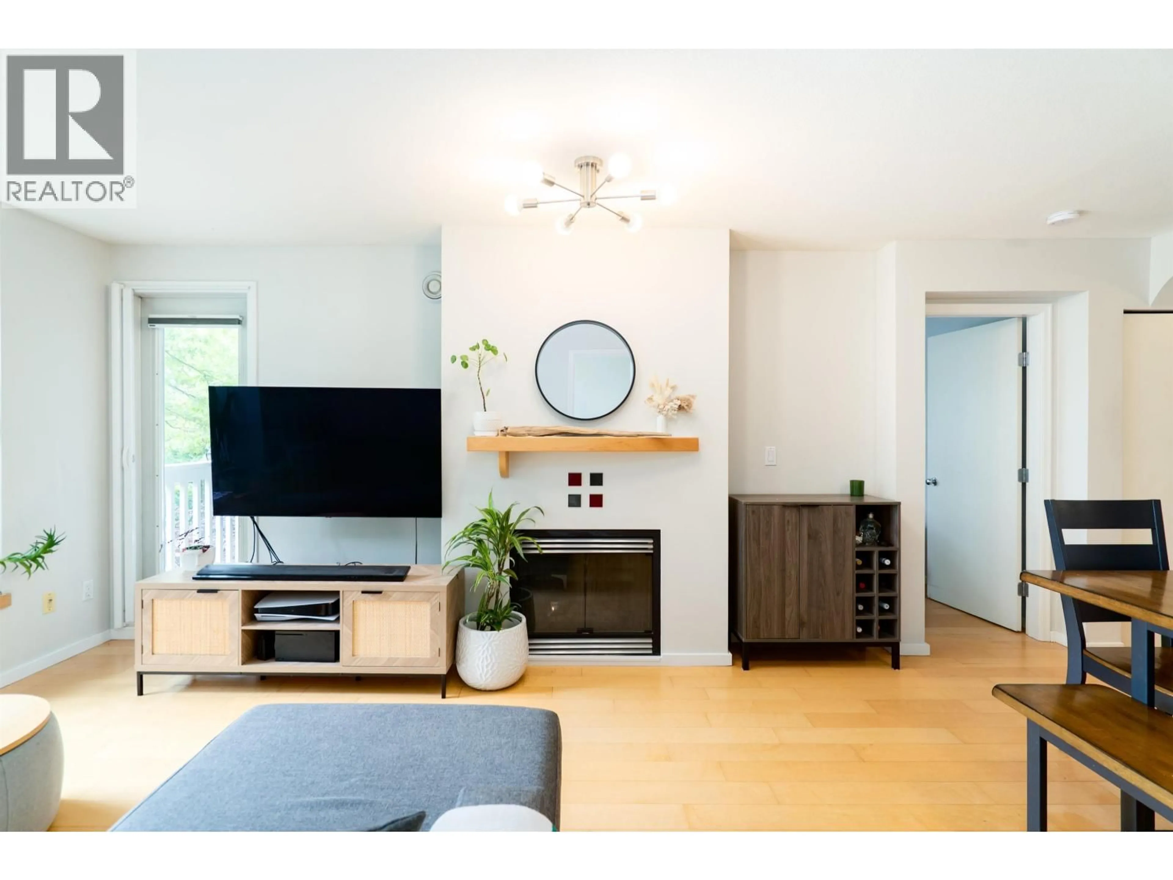 Living room with furniture, unknown for 202 - 6833 VILLAGE, Burnaby British Columbia V5E4M1