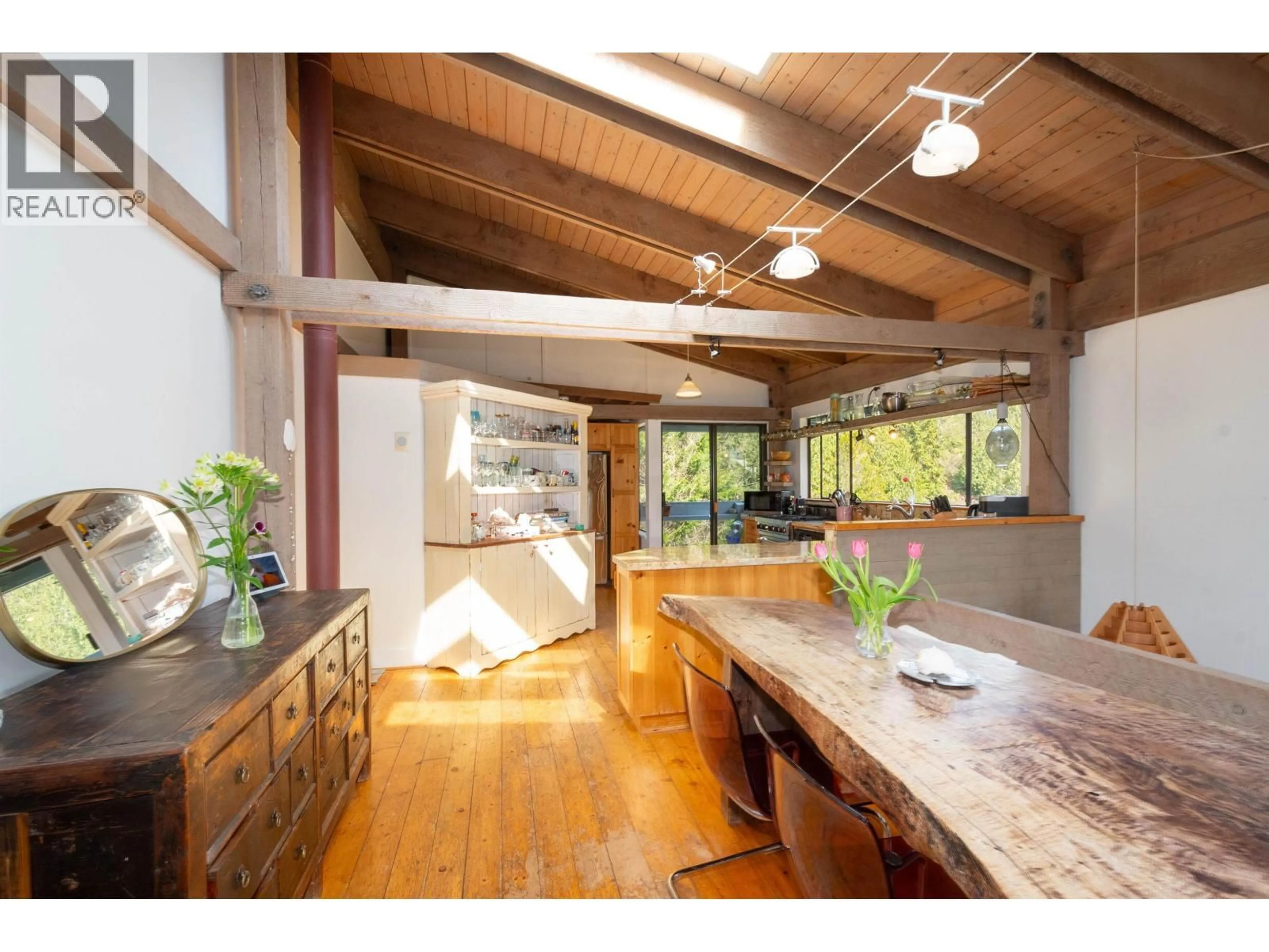 Open concept kitchen, wood/laminate floor for 4477 STRATHCONA ROAD, North Vancouver British Columbia V7G1G7