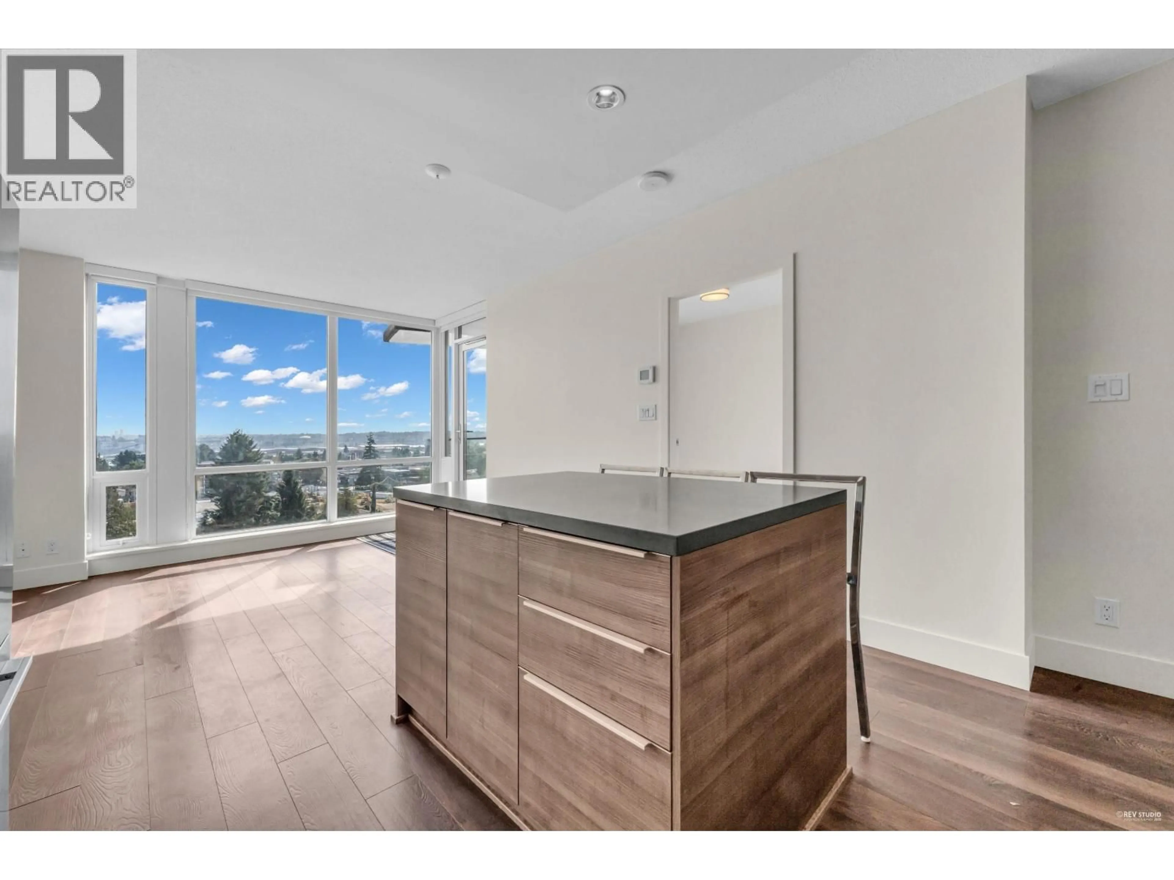 Open concept kitchen, wood/laminate floor for 1005 - 1550 FERN STREET, North Vancouver British Columbia V7J0A9