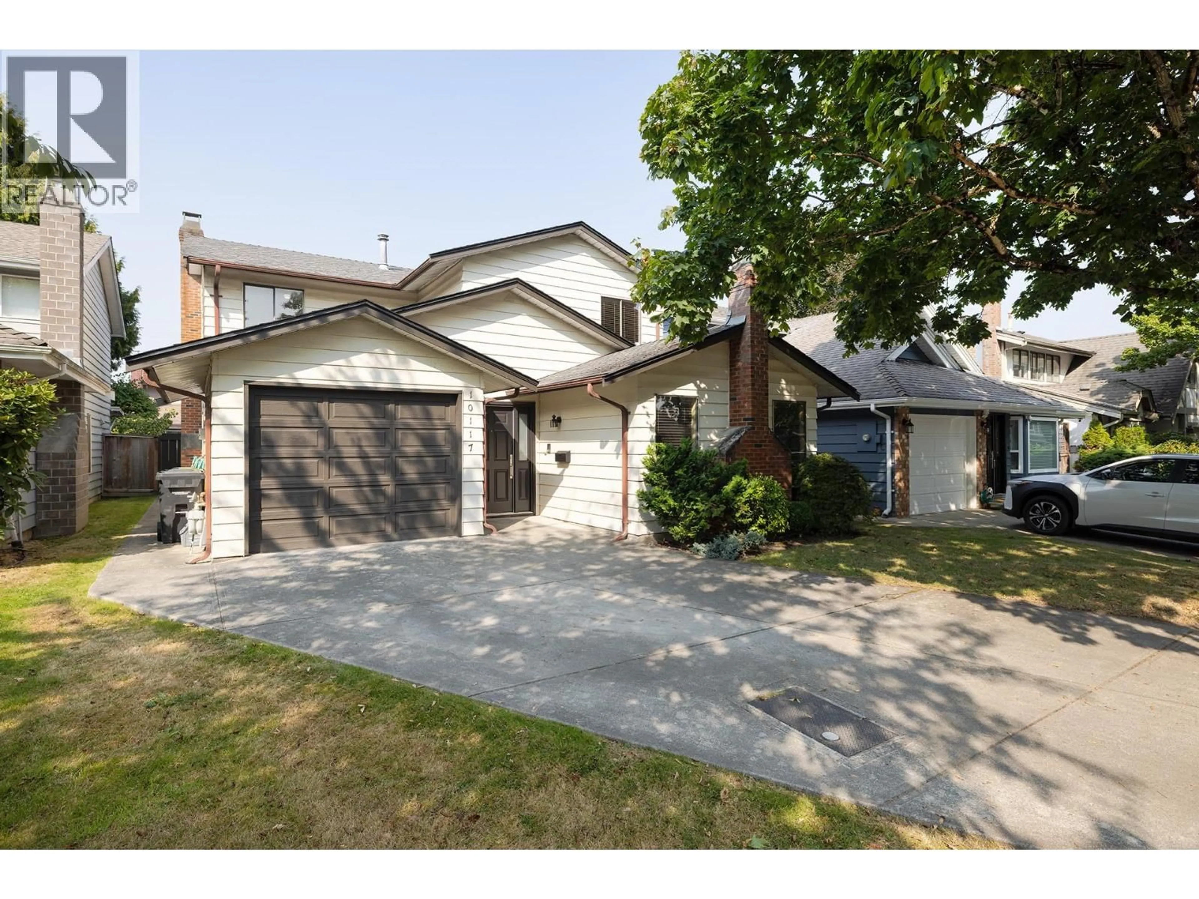 Home with vinyl exterior material, street for 10117 LAWSON DRIVE, Richmond British Columbia V7E5M2