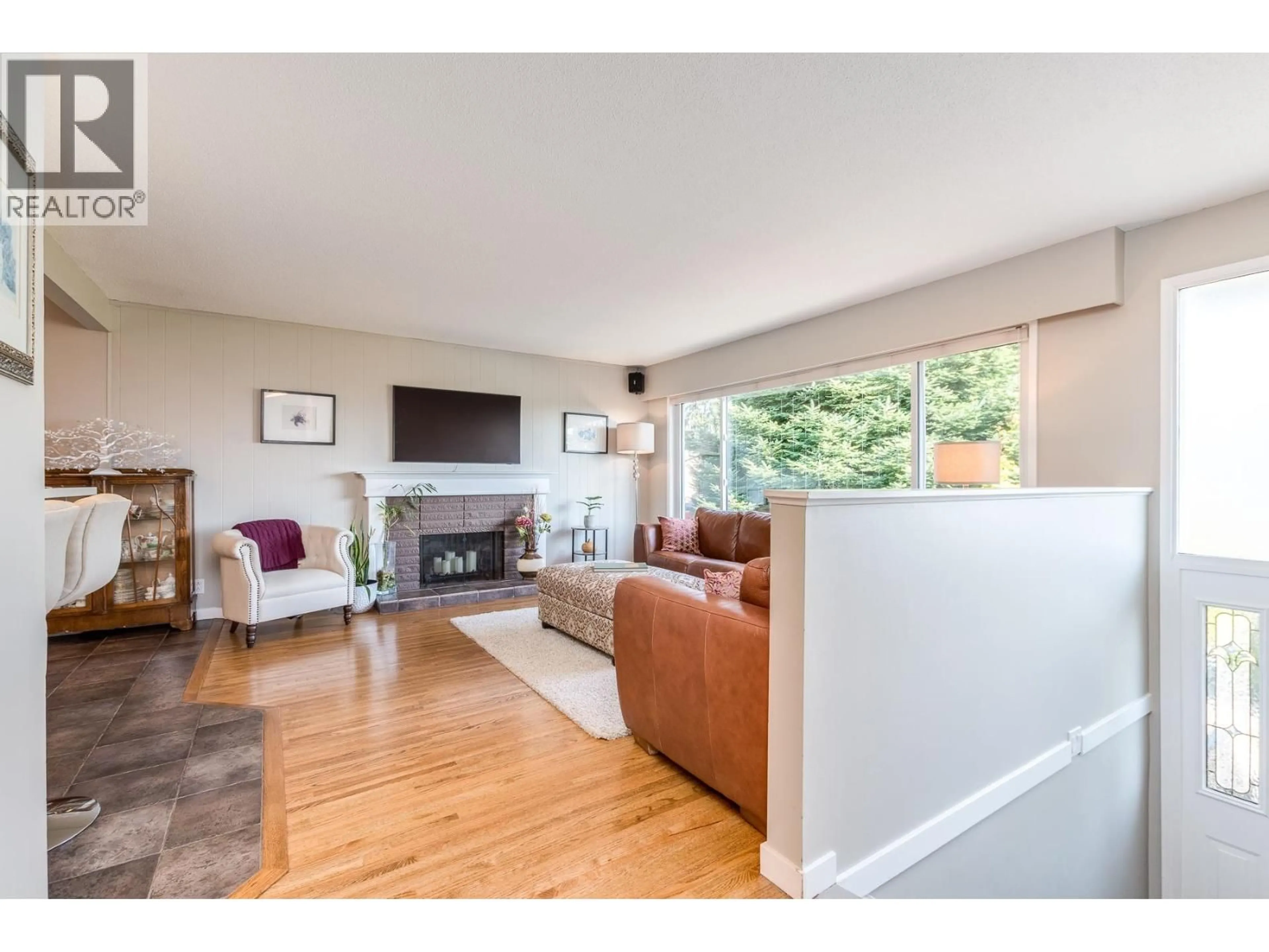 Living room with furniture, wood/laminate floor for 2116 AUDREY DRIVE, Port Coquitlam British Columbia V3C1H1