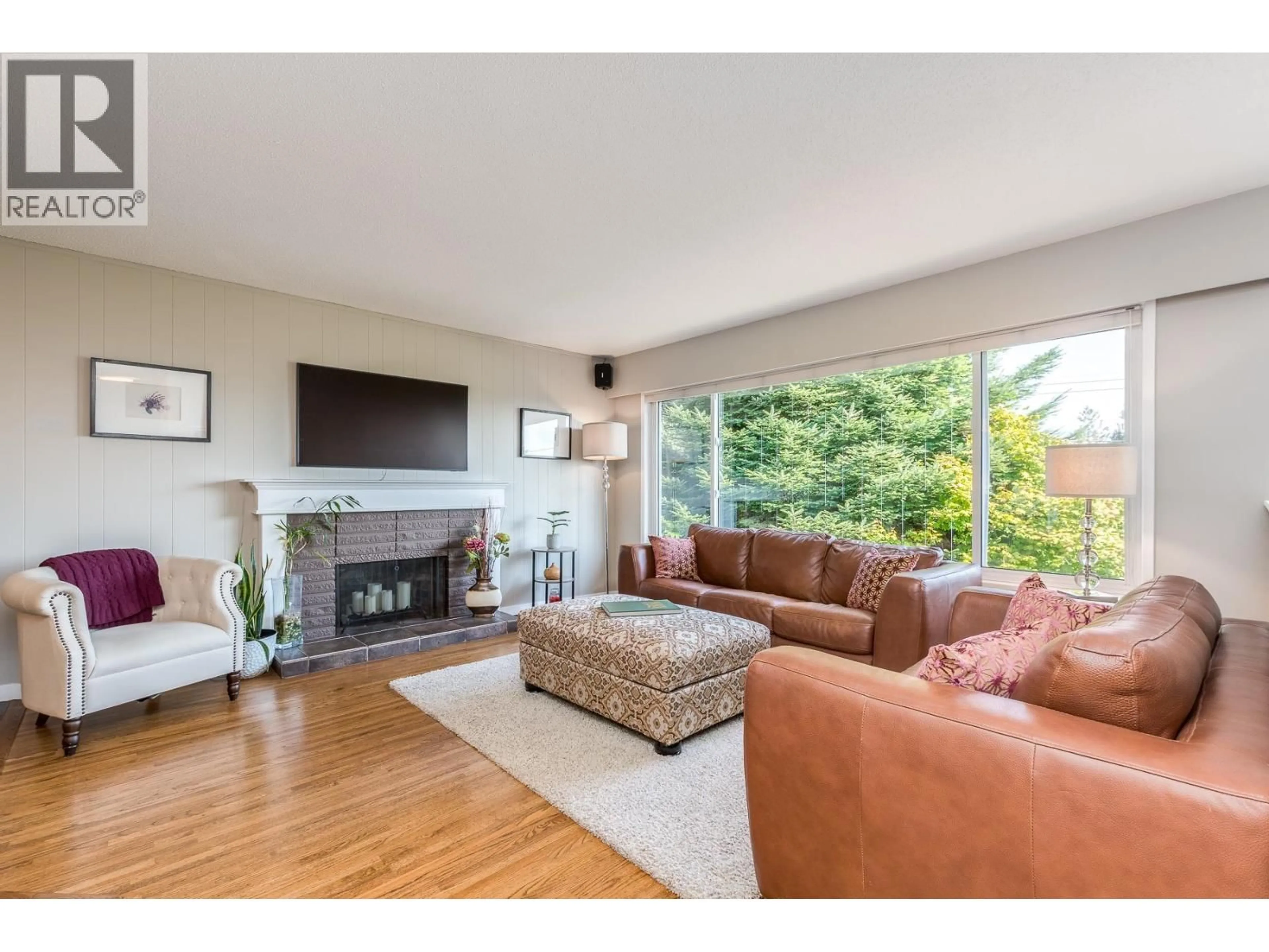 Living room with furniture, wood/laminate floor for 2116 AUDREY DRIVE, Port Coquitlam British Columbia V3C1H1
