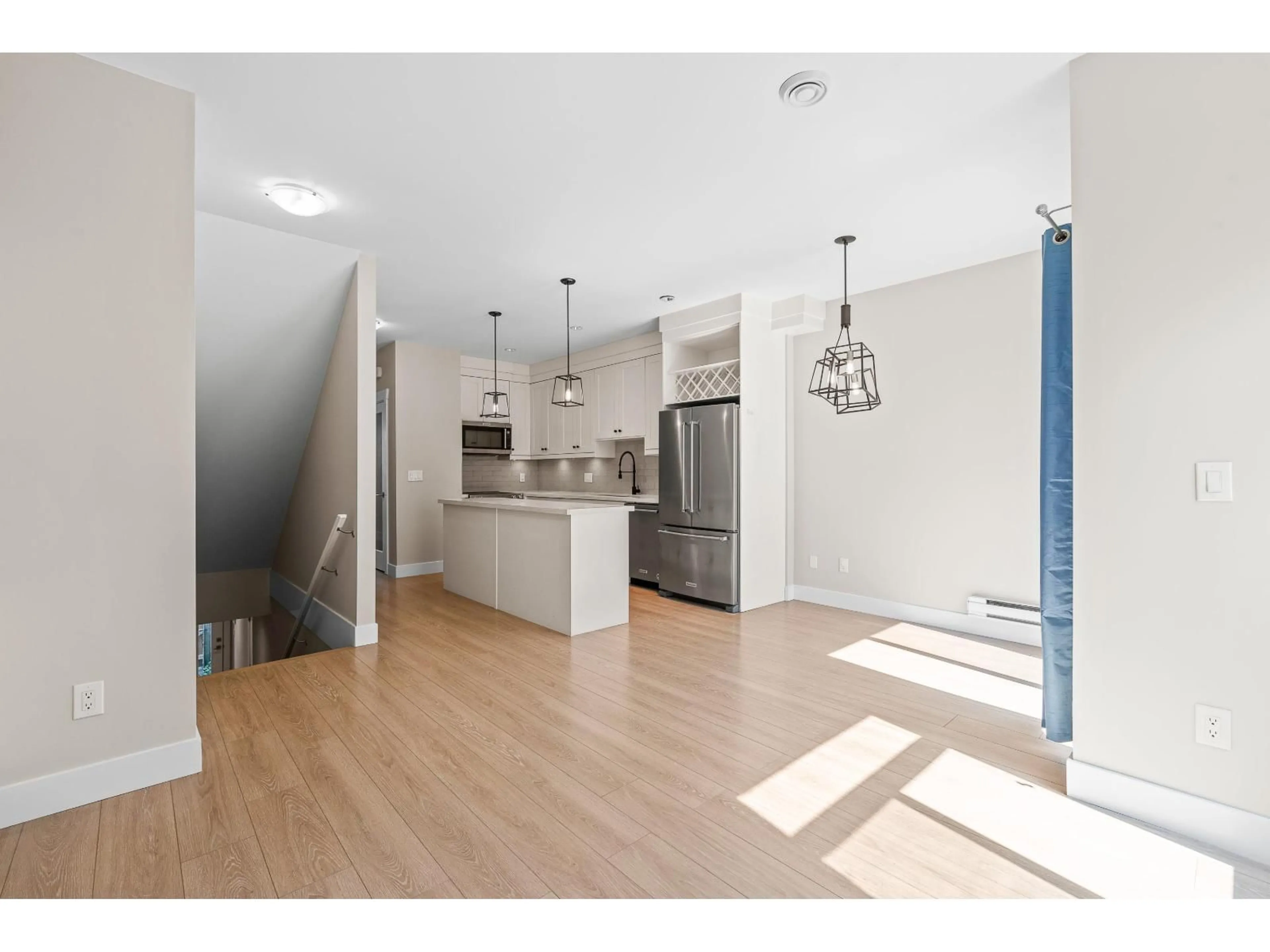 Open concept kitchen, wood/laminate floor for 17 - 5945 177B, Surrey British Columbia V3S4J7