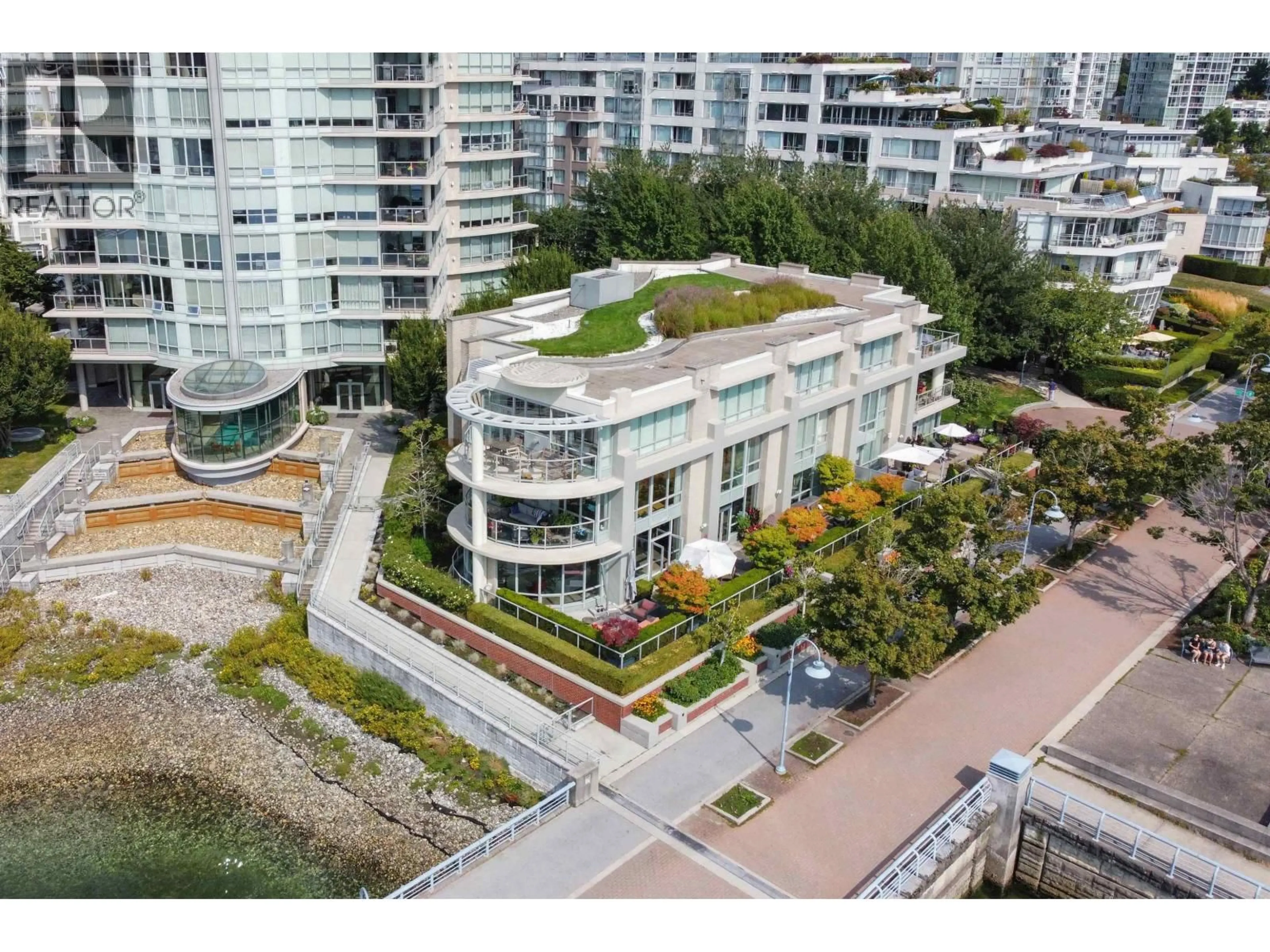 A pic from outside/outdoor area/front of a property/back of a property/a pic from drone, city buildings view from balcony for 110 - 1328 MARINASIDE CRESCENT, Vancouver British Columbia V6Z3B3