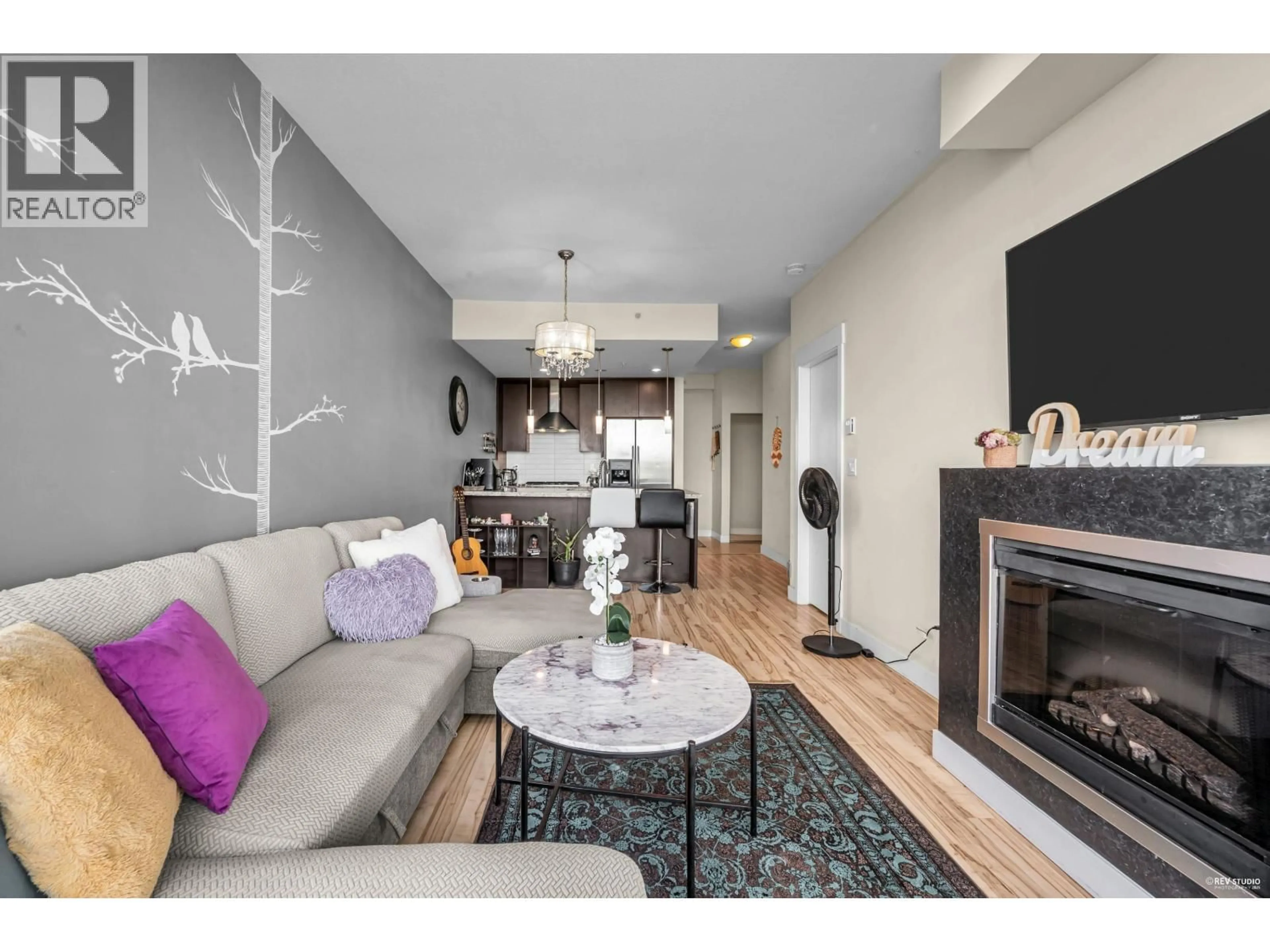 Living room with furniture, wood/laminate floor for 1606 - 7088 18TH AVENUE, Burnaby British Columbia V3N0A2
