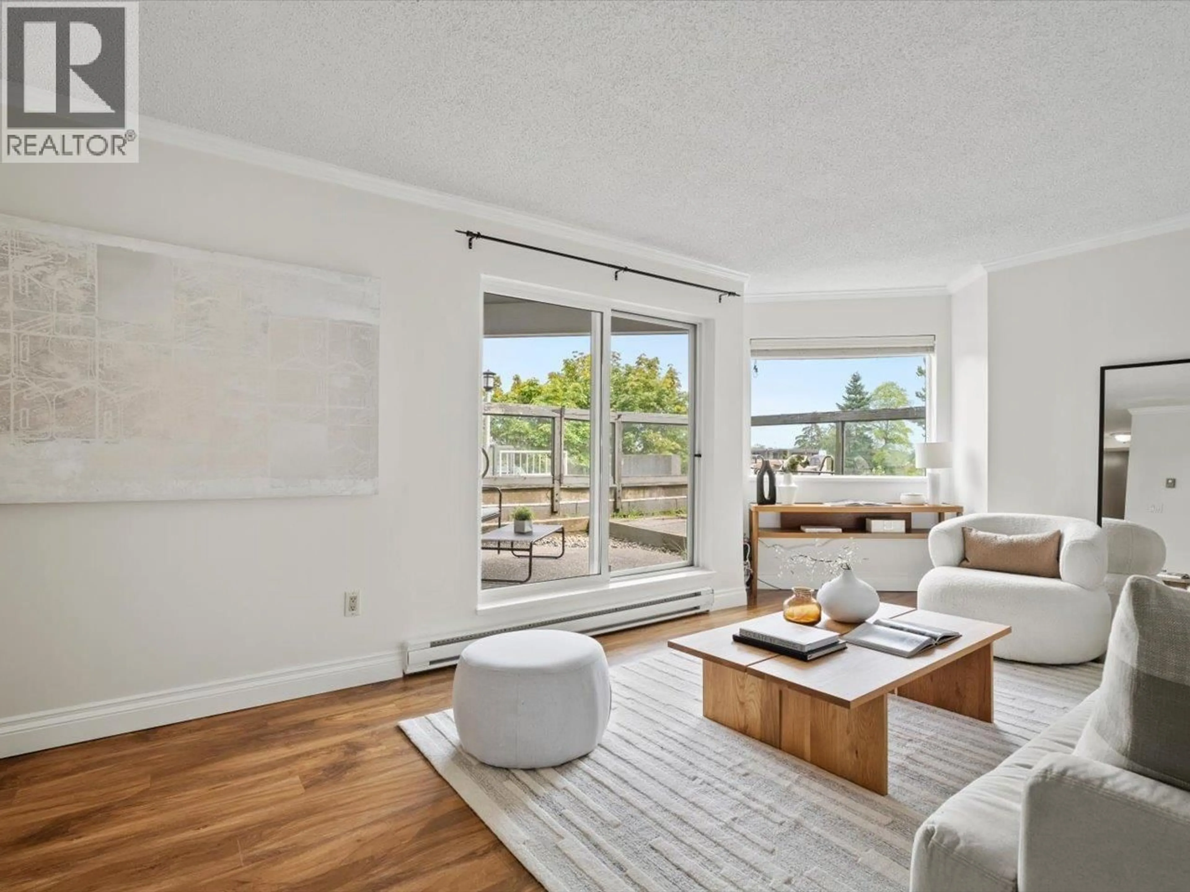Living room with furniture, wood/laminate floor for 110 - 1345 4TH AVENUE, Vancouver British Columbia V6H3Y8