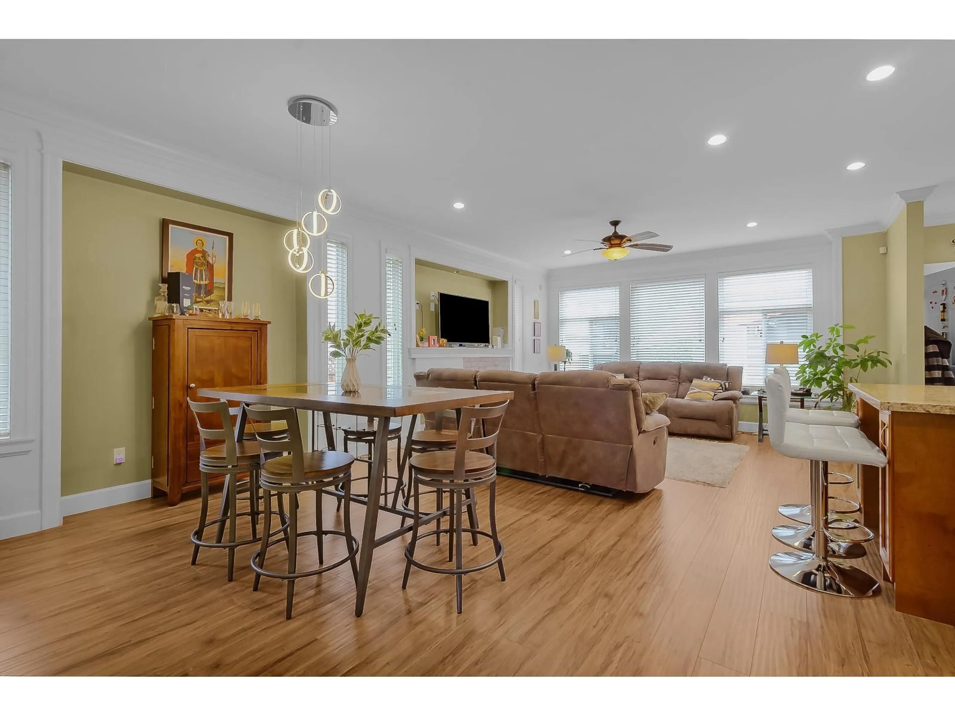 Living room with furniture, wood/laminate floor for 19913 72 AVENUE, Langley British Columbia V2Y3J2