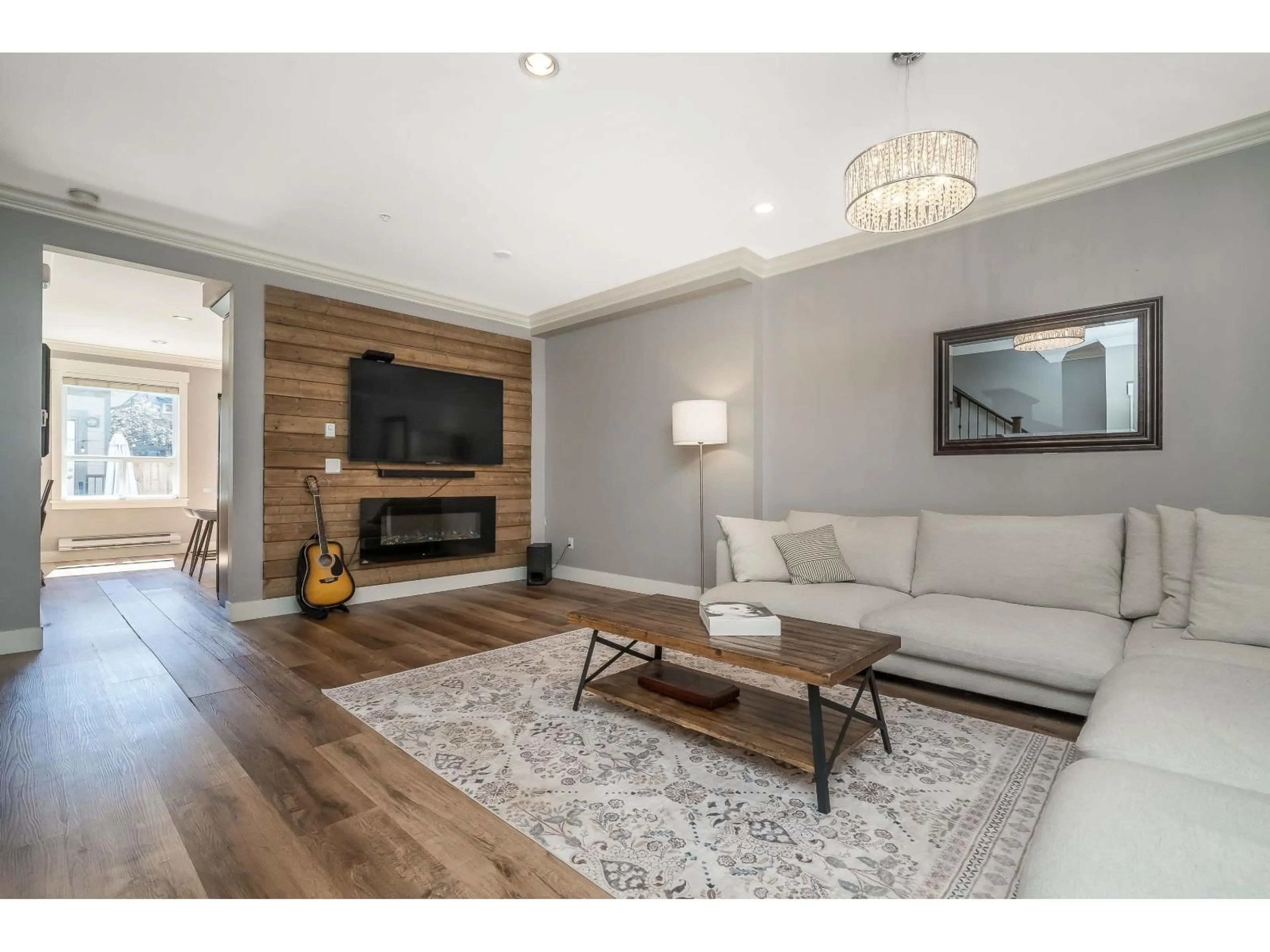 Living room with furniture, wood/laminate floor for 21066 80A, Langley British Columbia V2Y0J4
