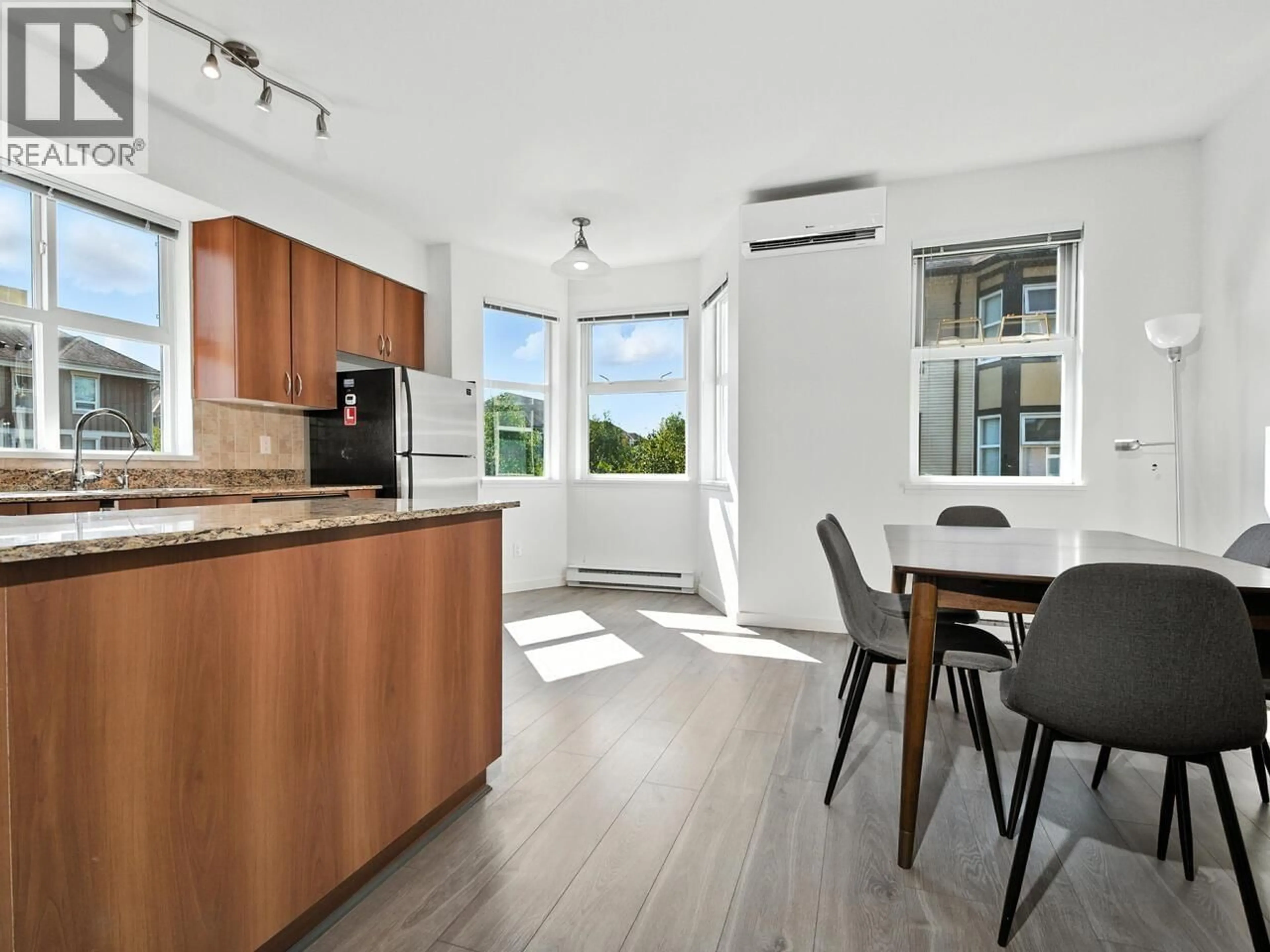Open concept kitchen, wood/laminate floor for 18 - 6099 ALDER STREET, Richmond British Columbia V6Y0A8