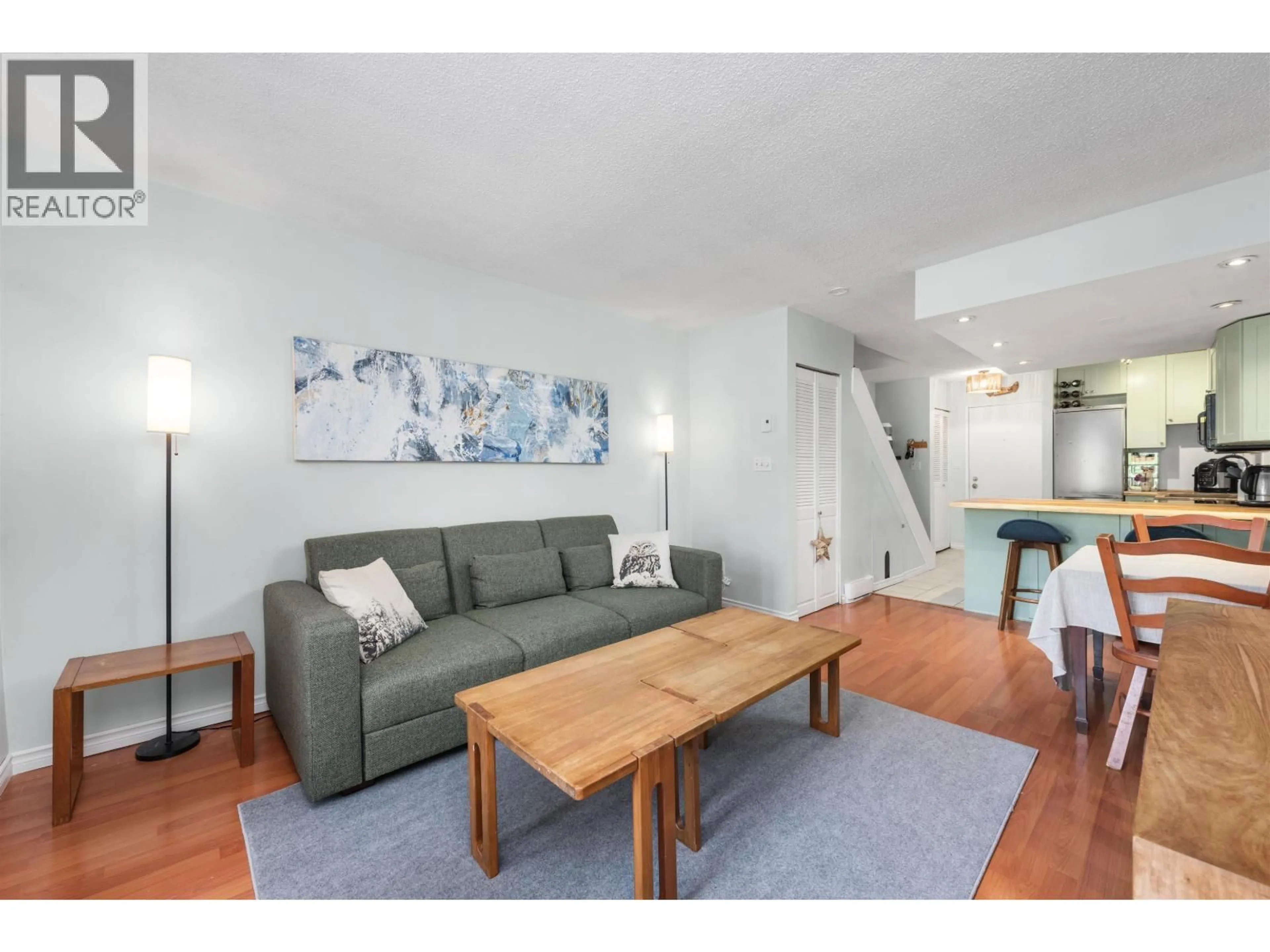 Living room with furniture, wood/laminate floor for 1 - 719 31ST AVENUE, Vancouver British Columbia V5V2W9