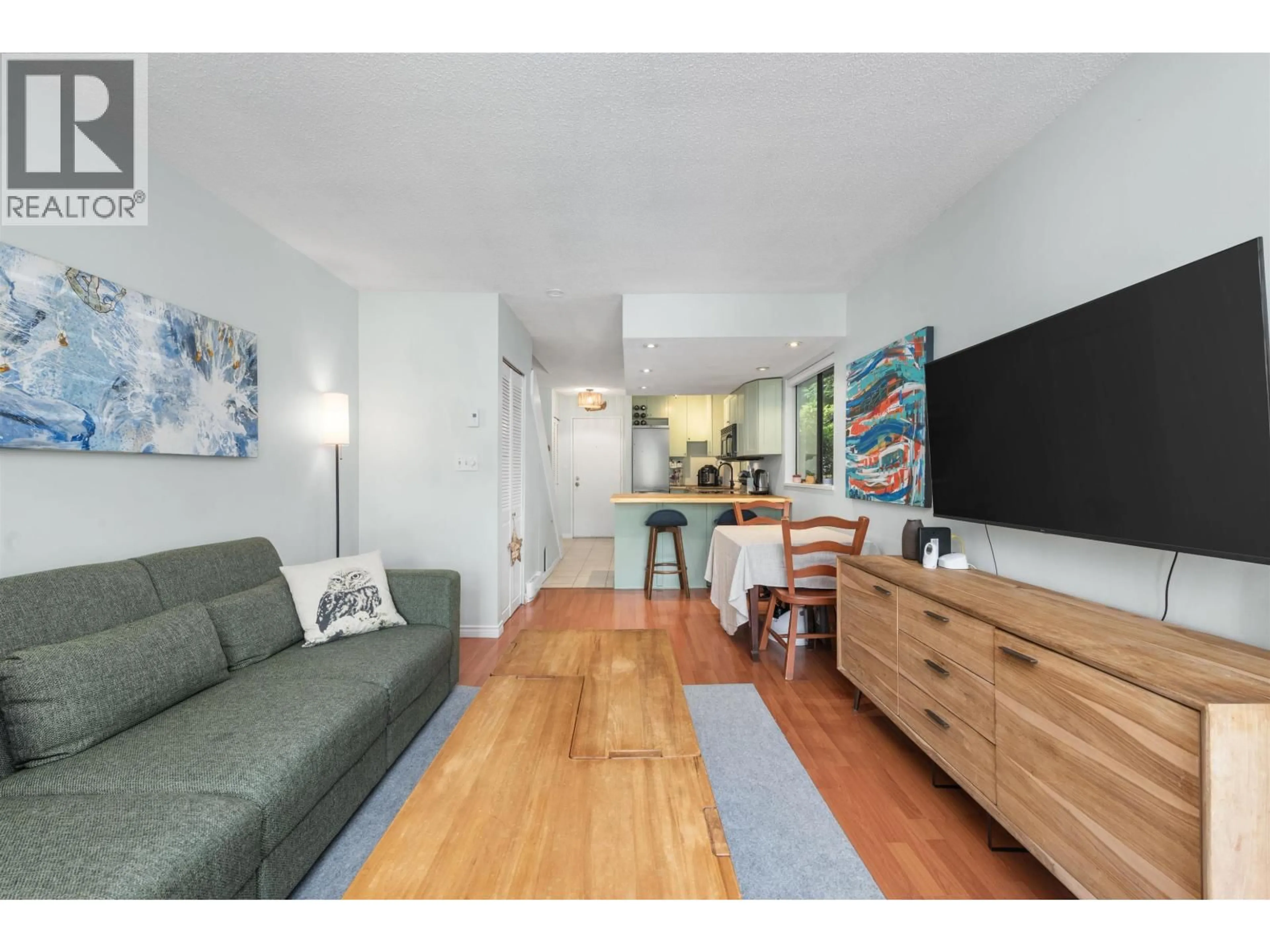 Living room with furniture, wood/laminate floor for 1 - 719 31ST AVENUE, Vancouver British Columbia V5V2W9