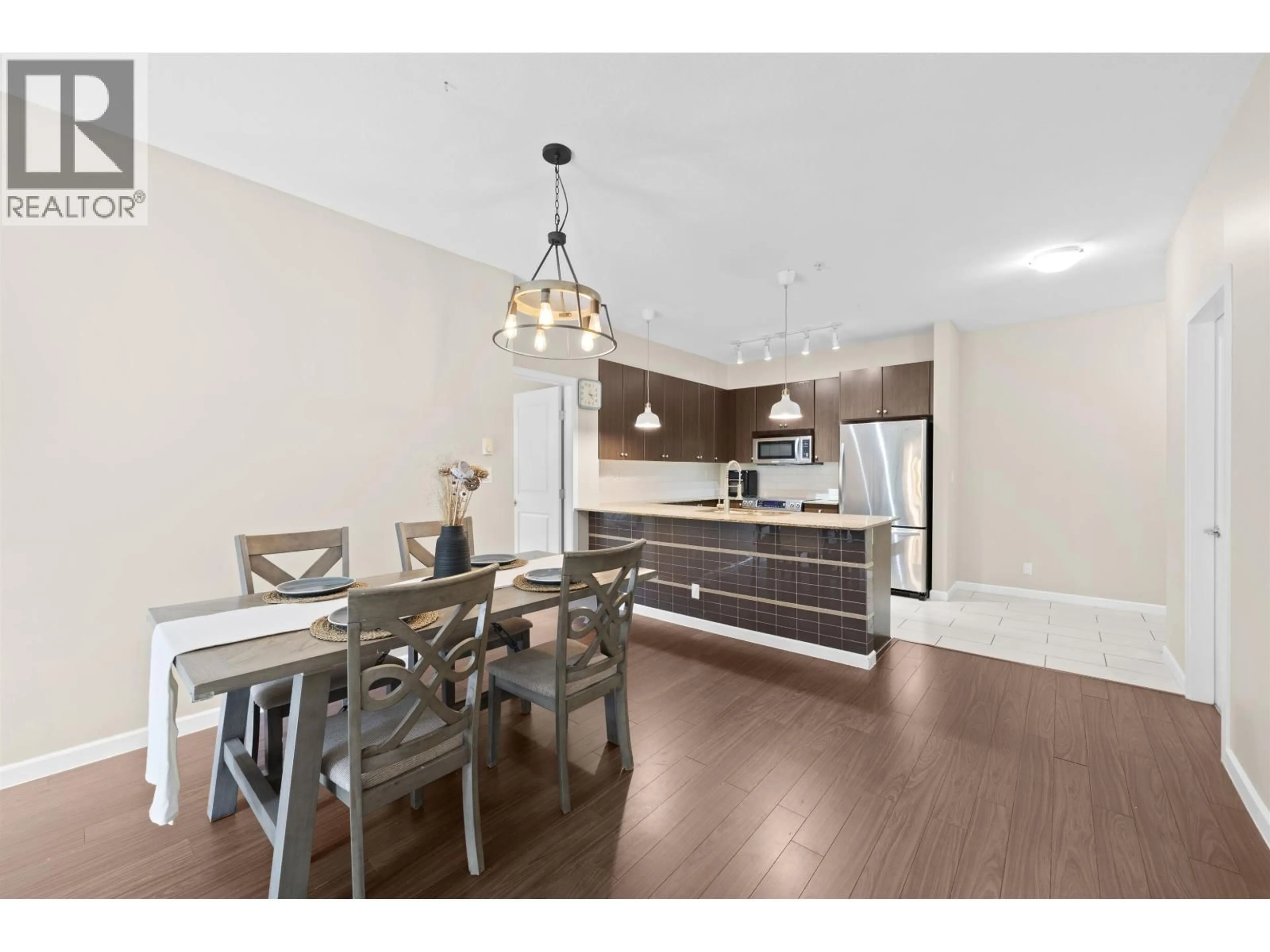 Open concept kitchen, wood/laminate floor for 209 - 270 FRANCIS WAY, New Westminster British Columbia V3L0C3
