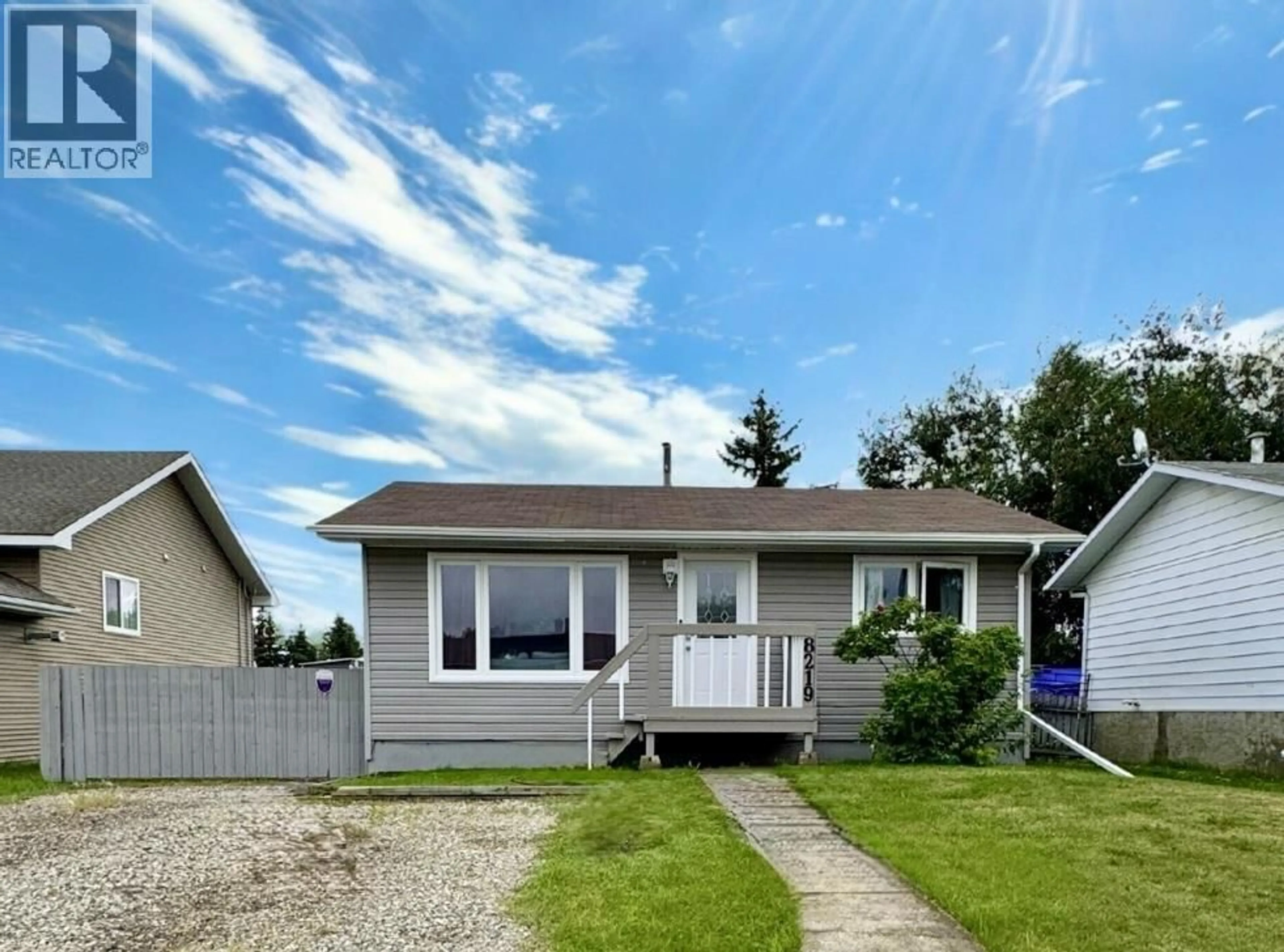Home with vinyl exterior material, street for 8219 98 AVENUE, Fort St. John British Columbia V1J1P4