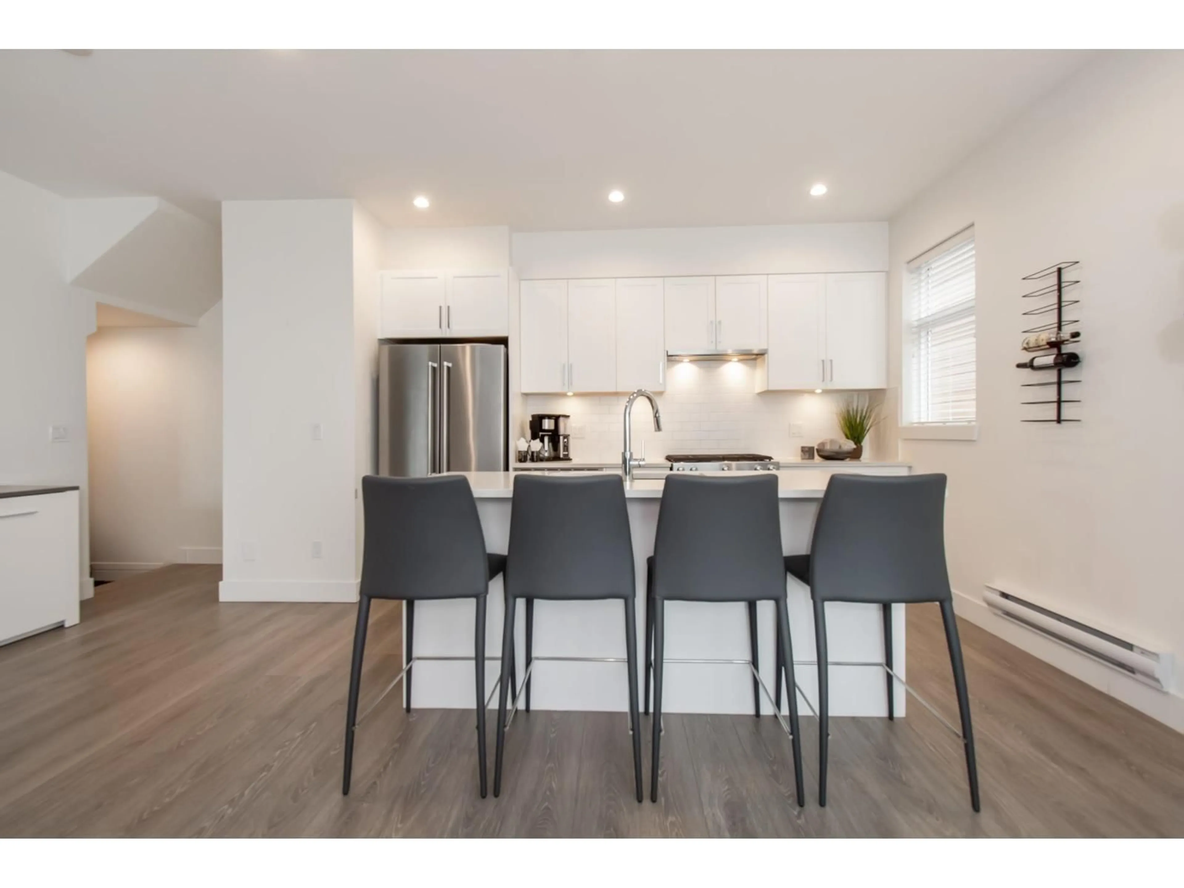 Open concept kitchen, wood/laminate floor for 156 - 16433 19, Surrey British Columbia V3Z0Z1
