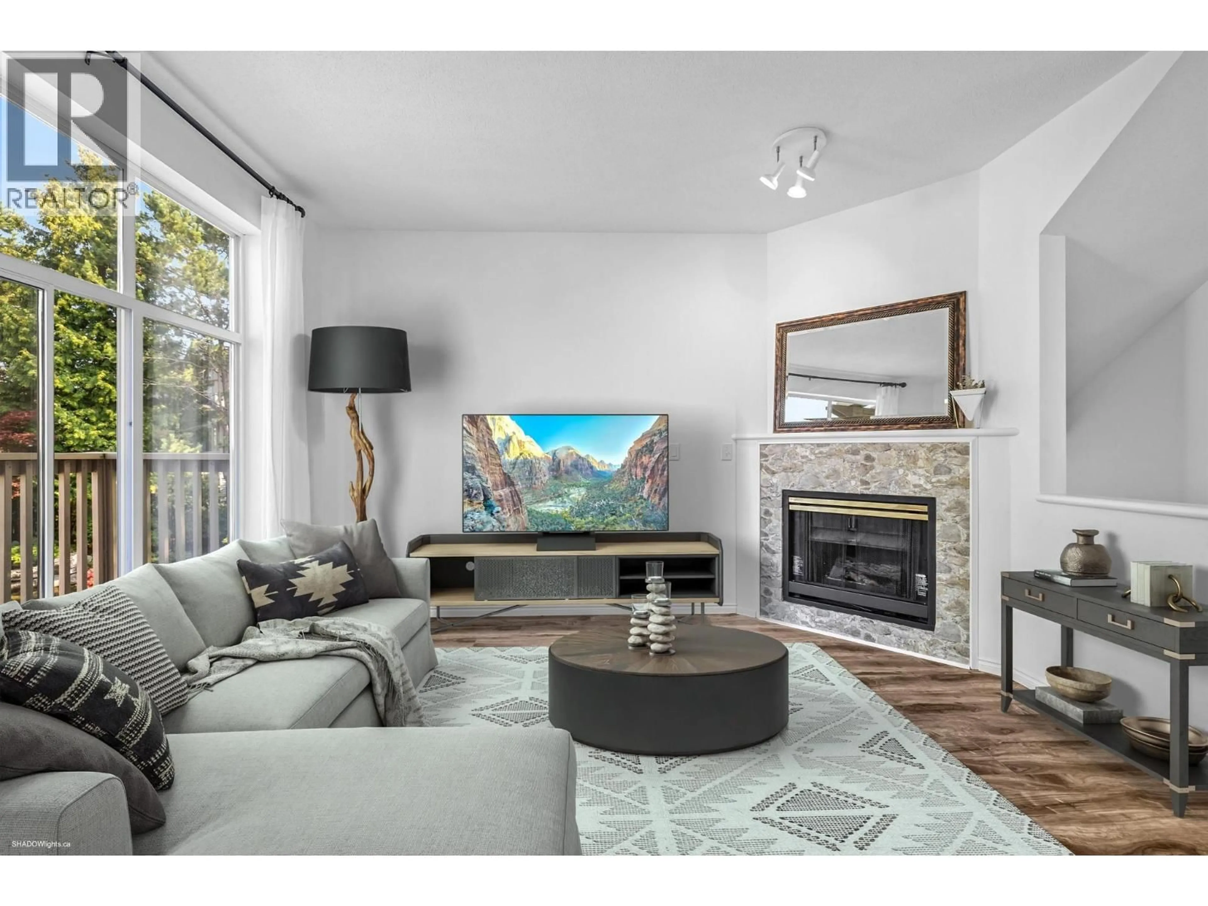 Living room with furniture, wood/laminate floor for 74 - 6588 BARNARD DRIVE, Richmond British Columbia V7C5R8