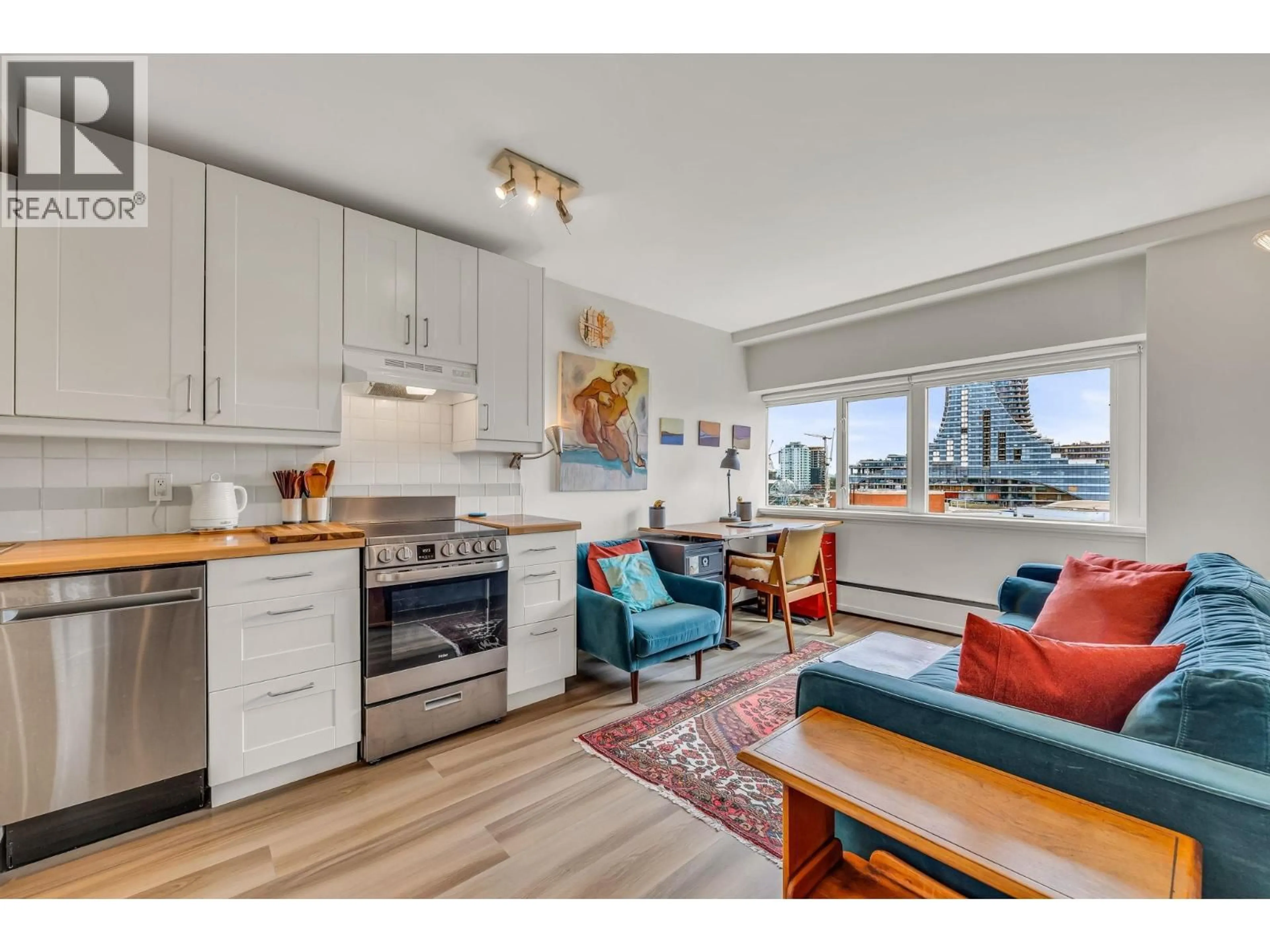 Open concept kitchen, wood/laminate floor for 701 - 6026 TISDALL STREET, Vancouver British Columbia V5Z3N2