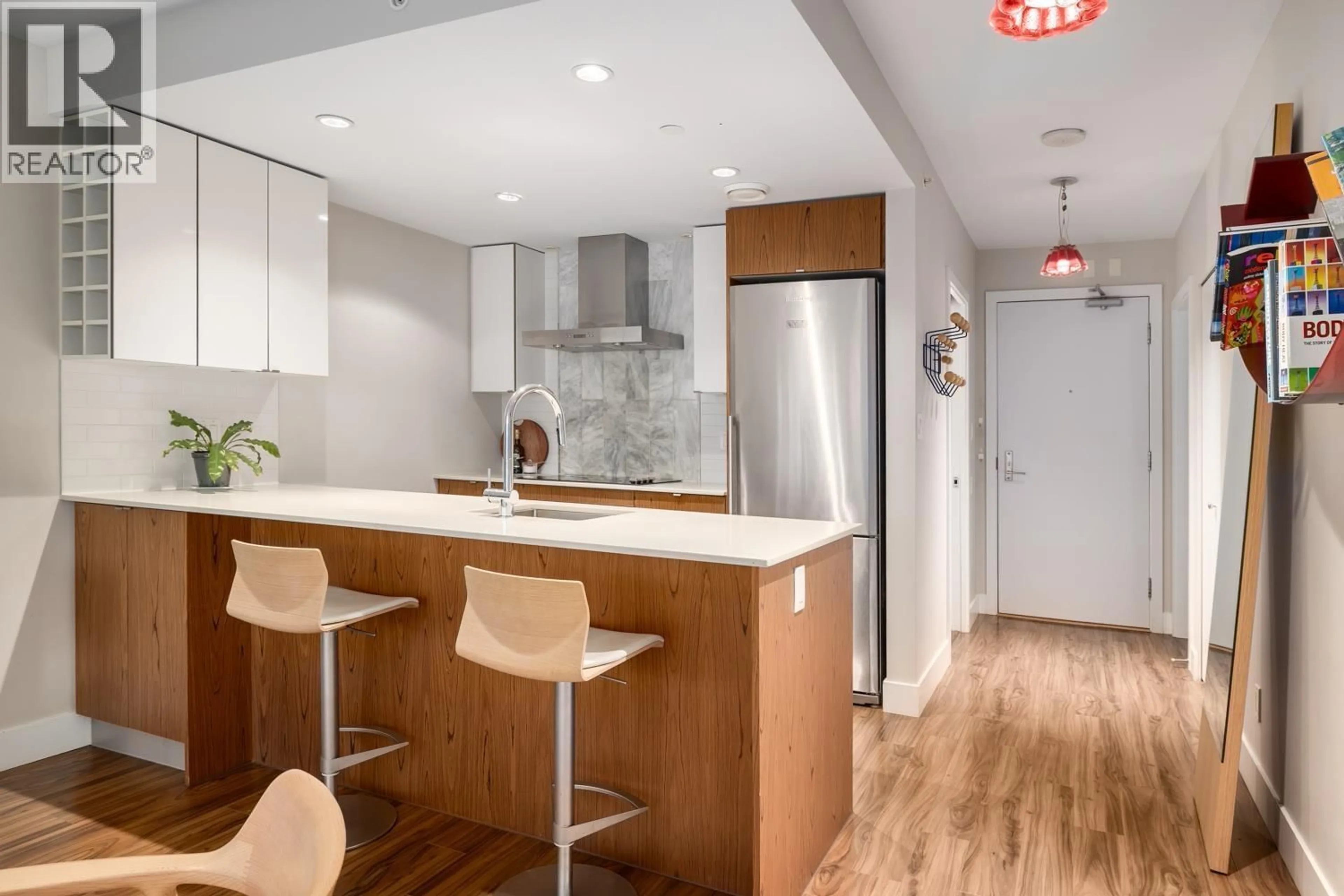 Open concept kitchen, wood/laminate floor for 218 - 159 2ND AVENUE, Vancouver British Columbia V5Y0L8