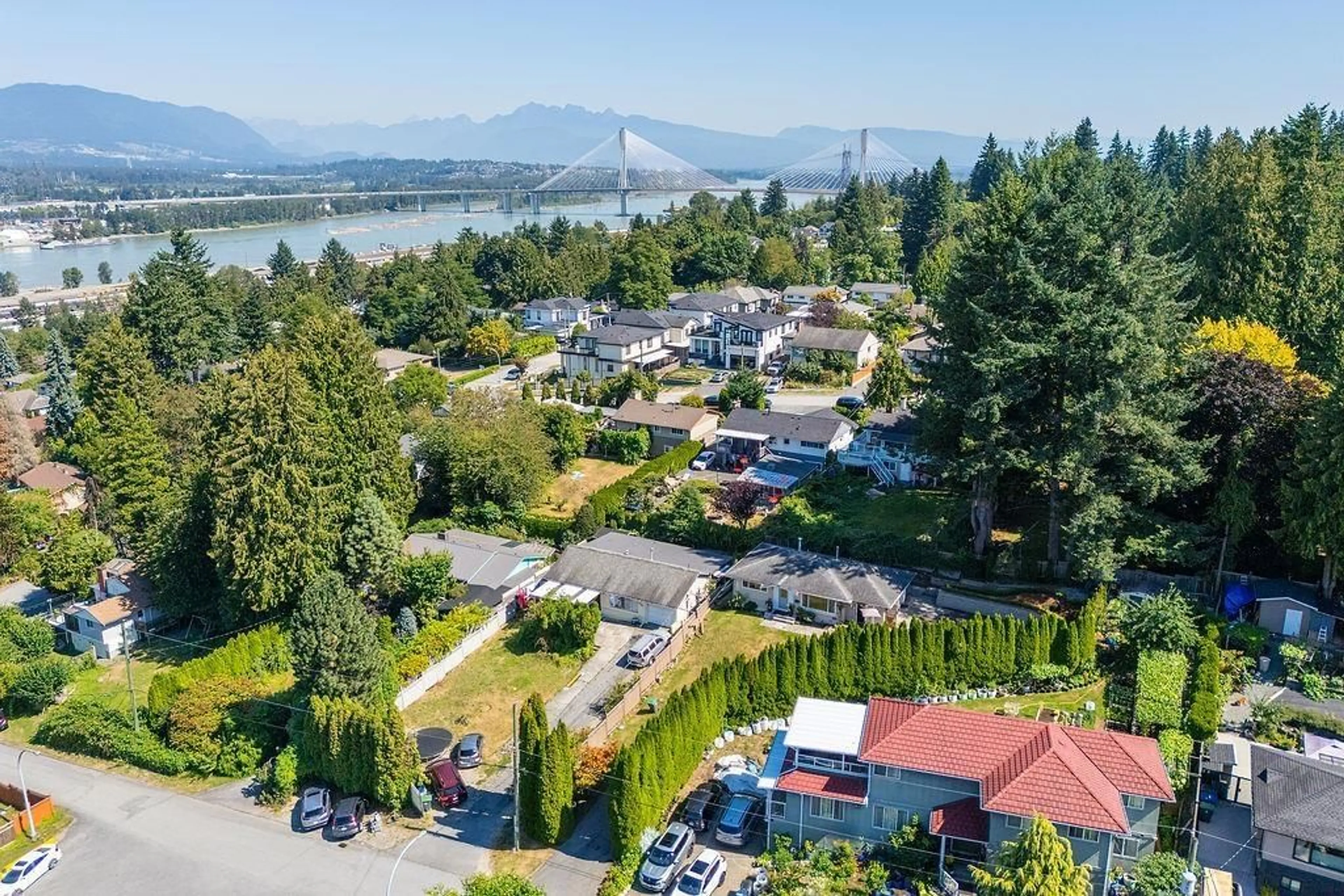 A pic from outside/outdoor area/front of a property/back of a property/a pic from drone, water/lake/river/ocean view for 11458 139, Surrey British Columbia V3R3E3
