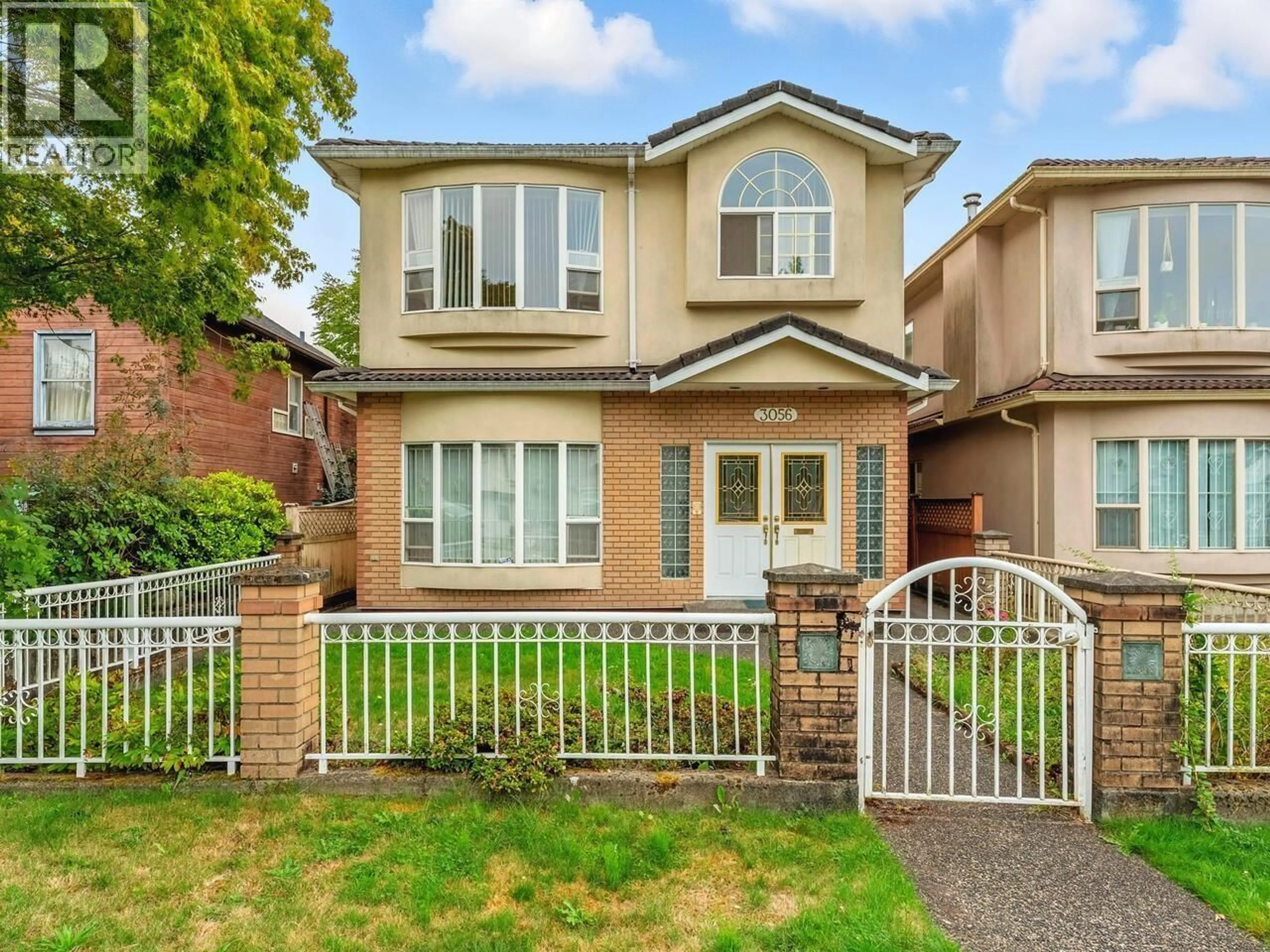 Home with brick exterior material, street for 3056 ADANAC STREET, Vancouver British Columbia V5K2N7