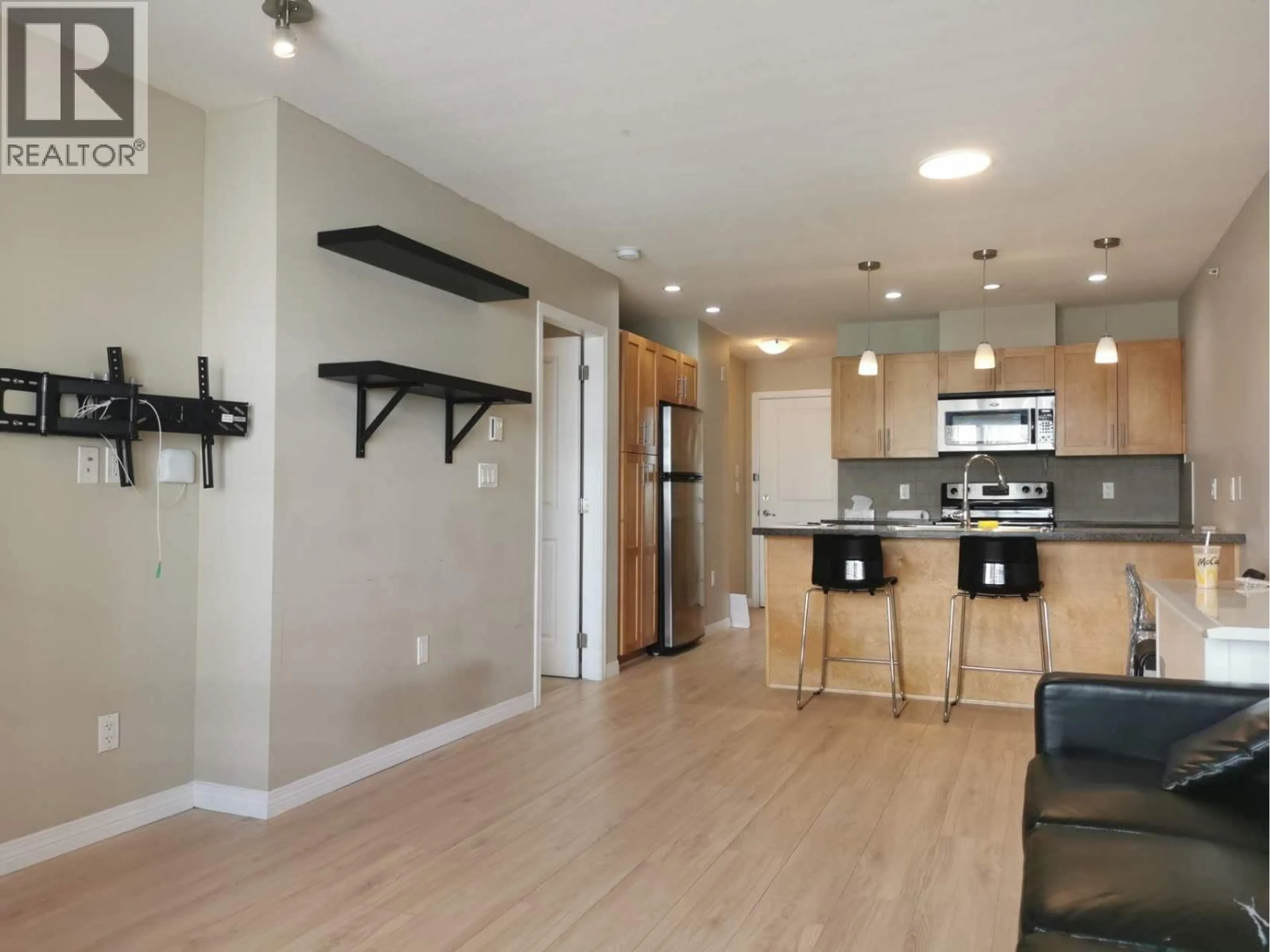 Open concept kitchen, wood/laminate floor for 307 - 5000 IMPERIAL STREET, Burnaby British Columbia V5J1C8
