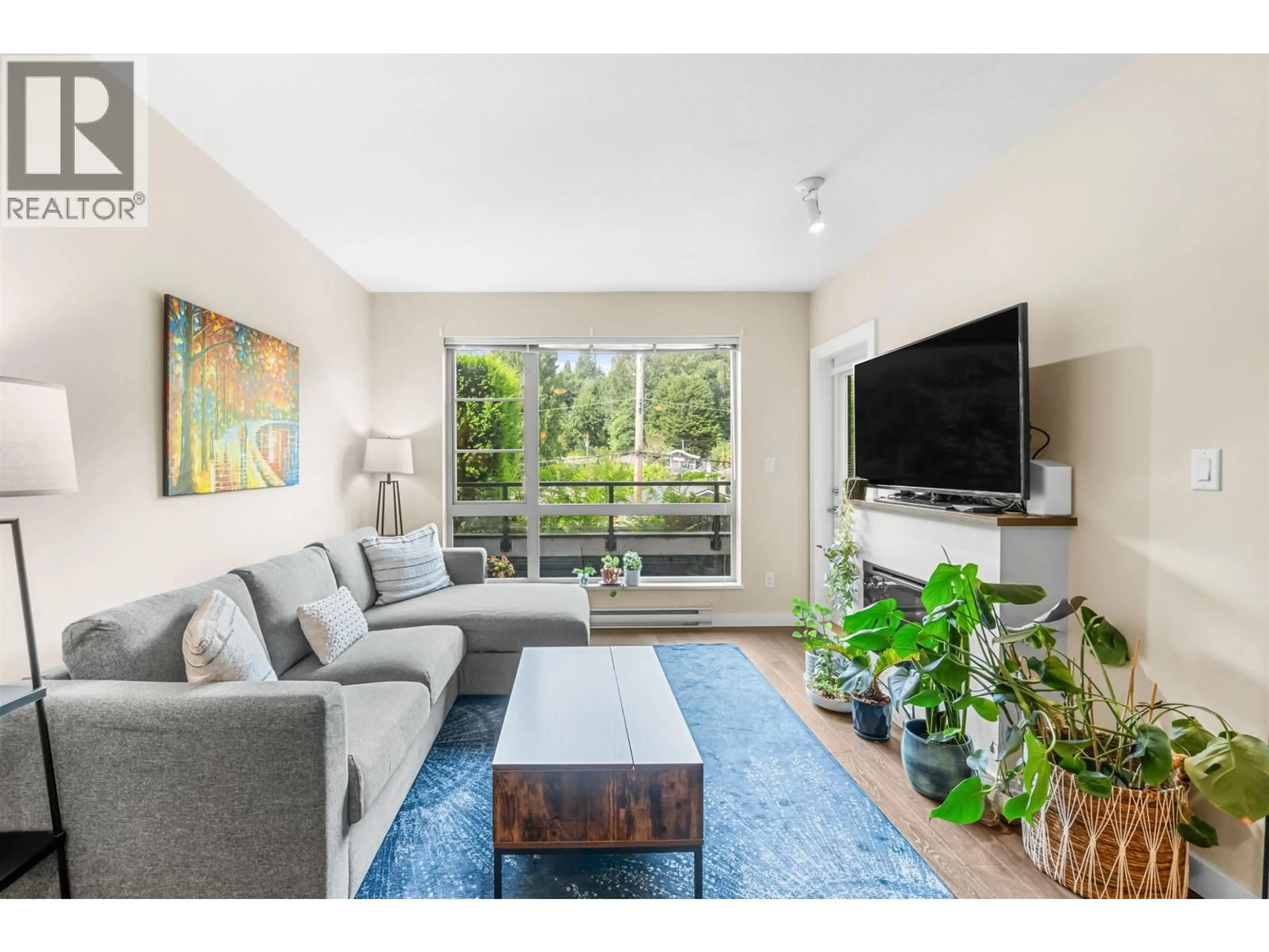 Living room with furniture, unknown for 215 - 1330 MARINE DRIVE, North Vancouver British Columbia V7P1T4