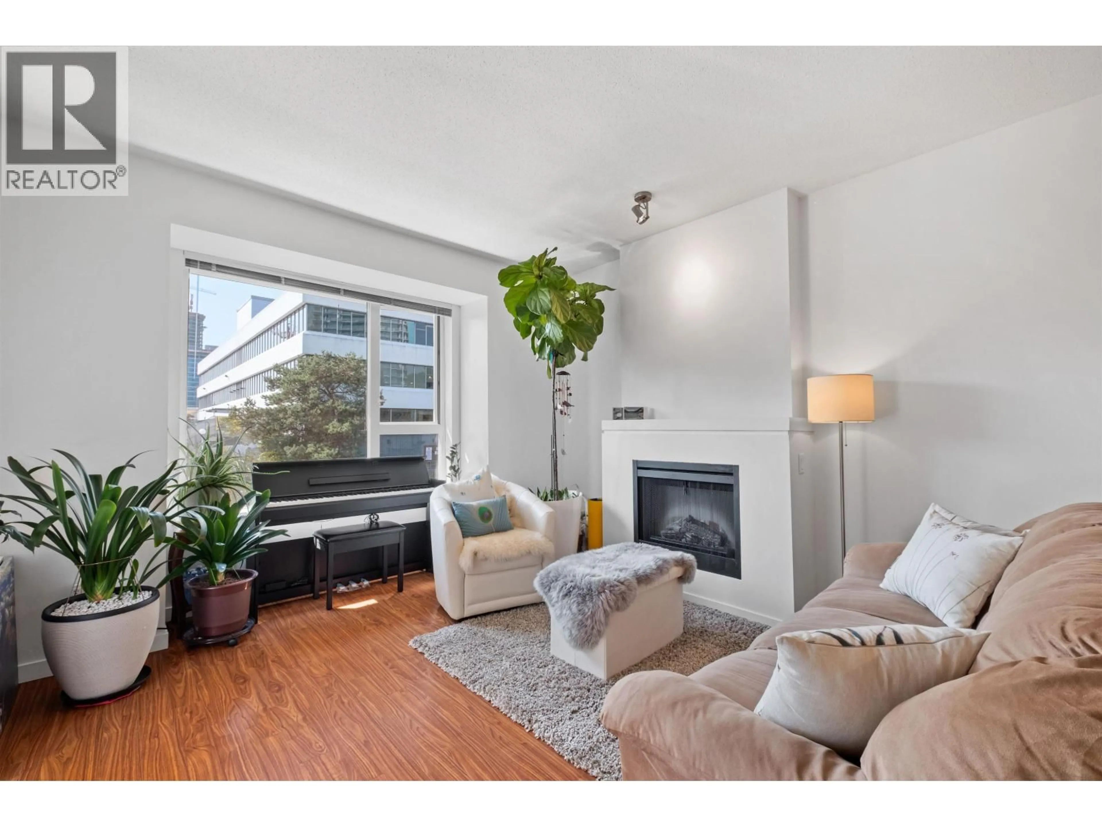 Living room with furniture, wood/laminate floor for 410 - 4723 DAWSON STREET, Burnaby British Columbia V5C0A7
