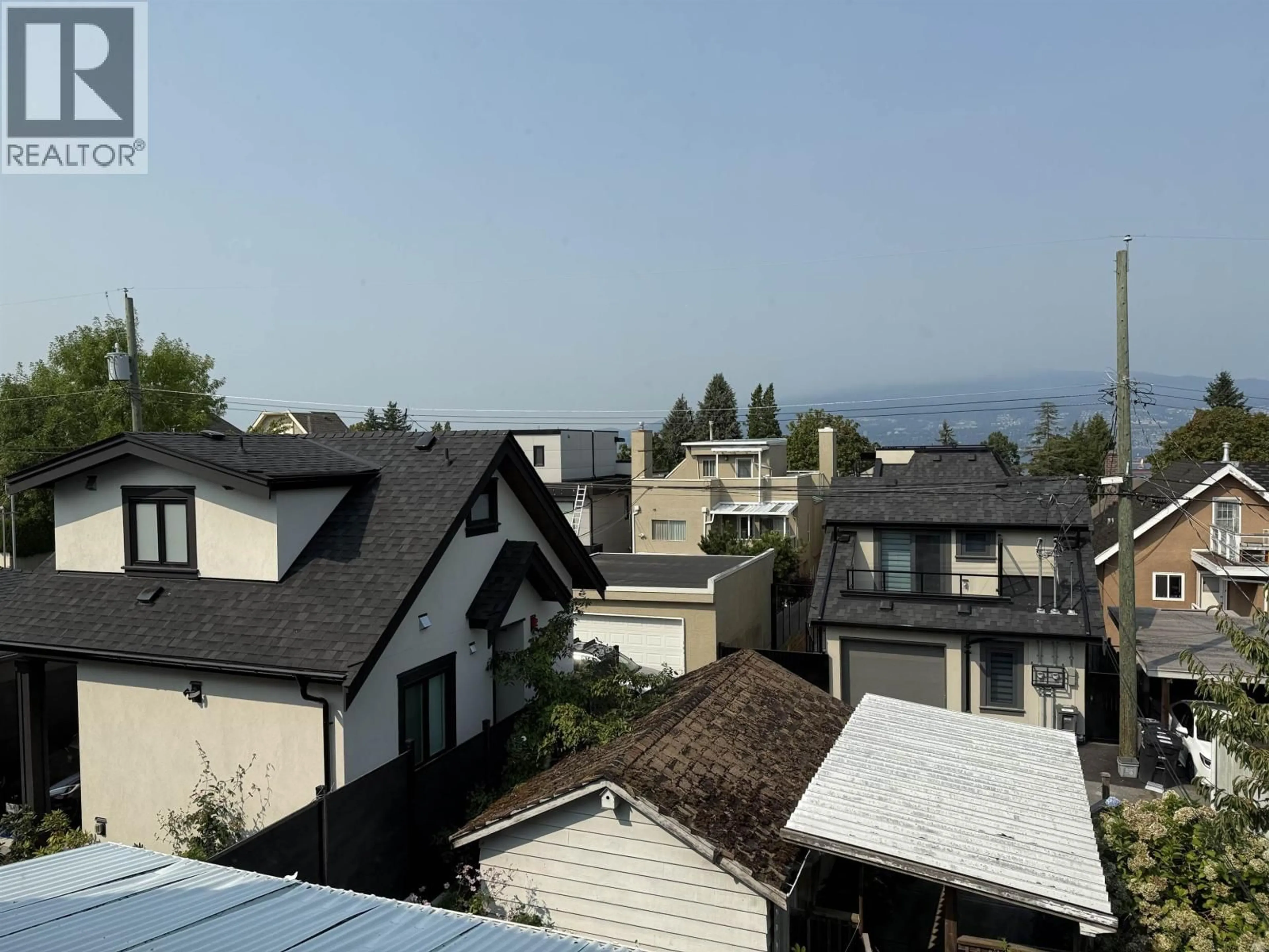 A pic from outside/outdoor area/front of a property/back of a property/a pic from drone, mountain view for 4029 11TH AVENUE, Vancouver British Columbia V6R2L4