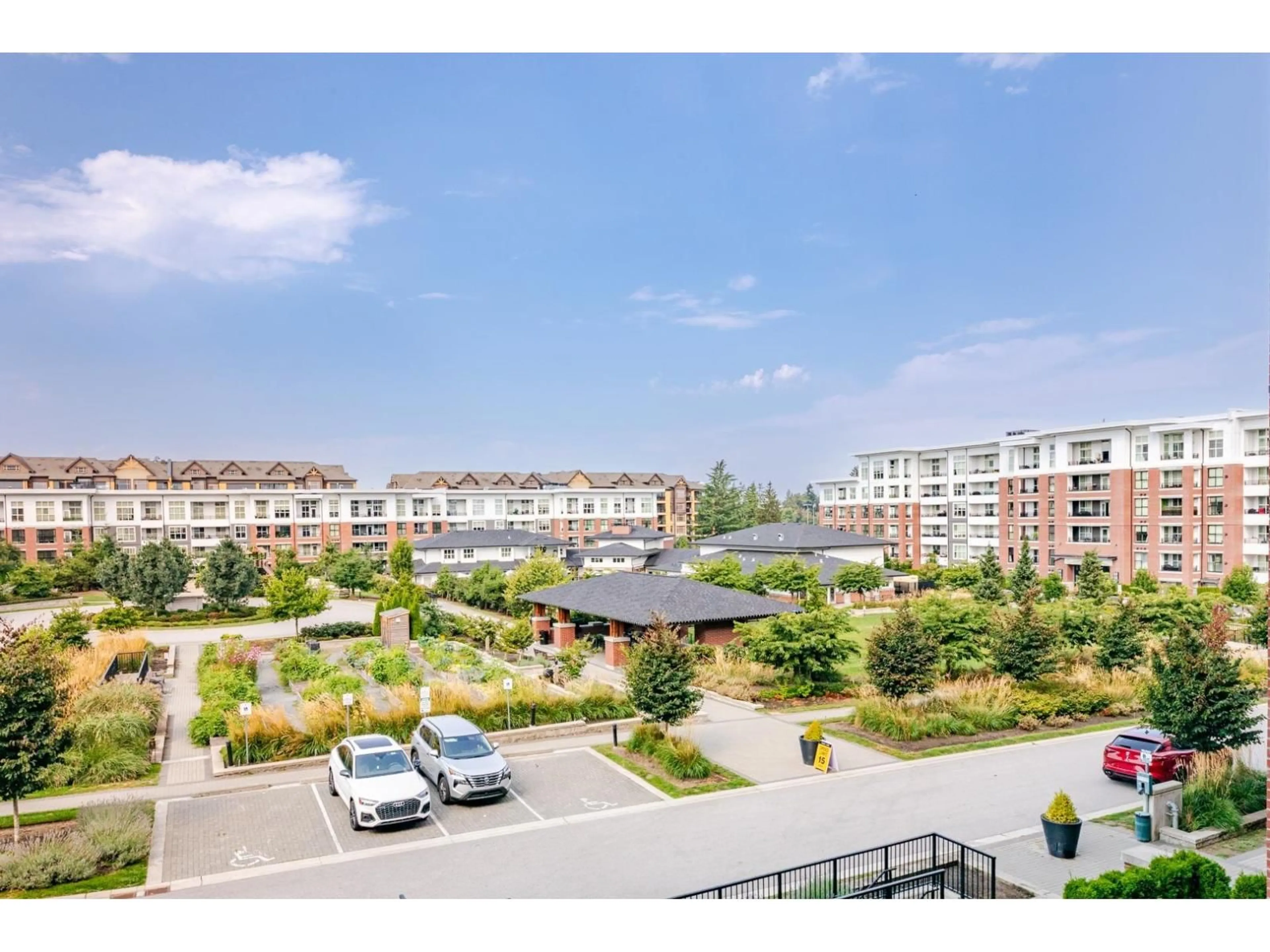 A pic from outside/outdoor area/front of a property/back of a property/a pic from drone, city buildings view from balcony for C327 - 8150 207, Langley British Columbia V2Y4J4