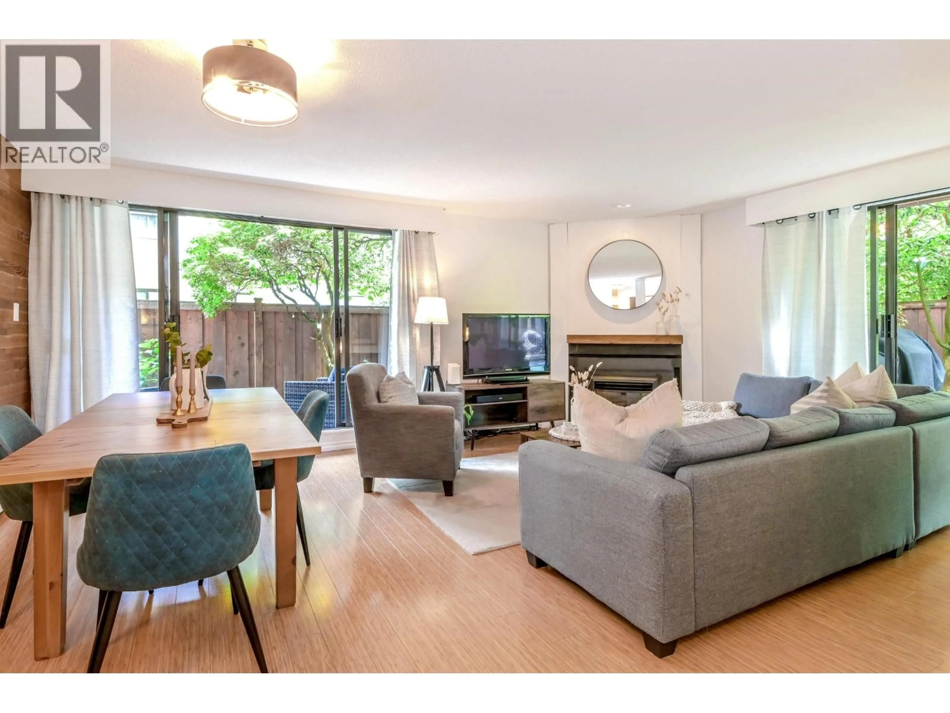 Living room with furniture, wood/laminate floor for 109 - 708 EIGHTH AVENUE, New Westminster British Columbia V3M2R3