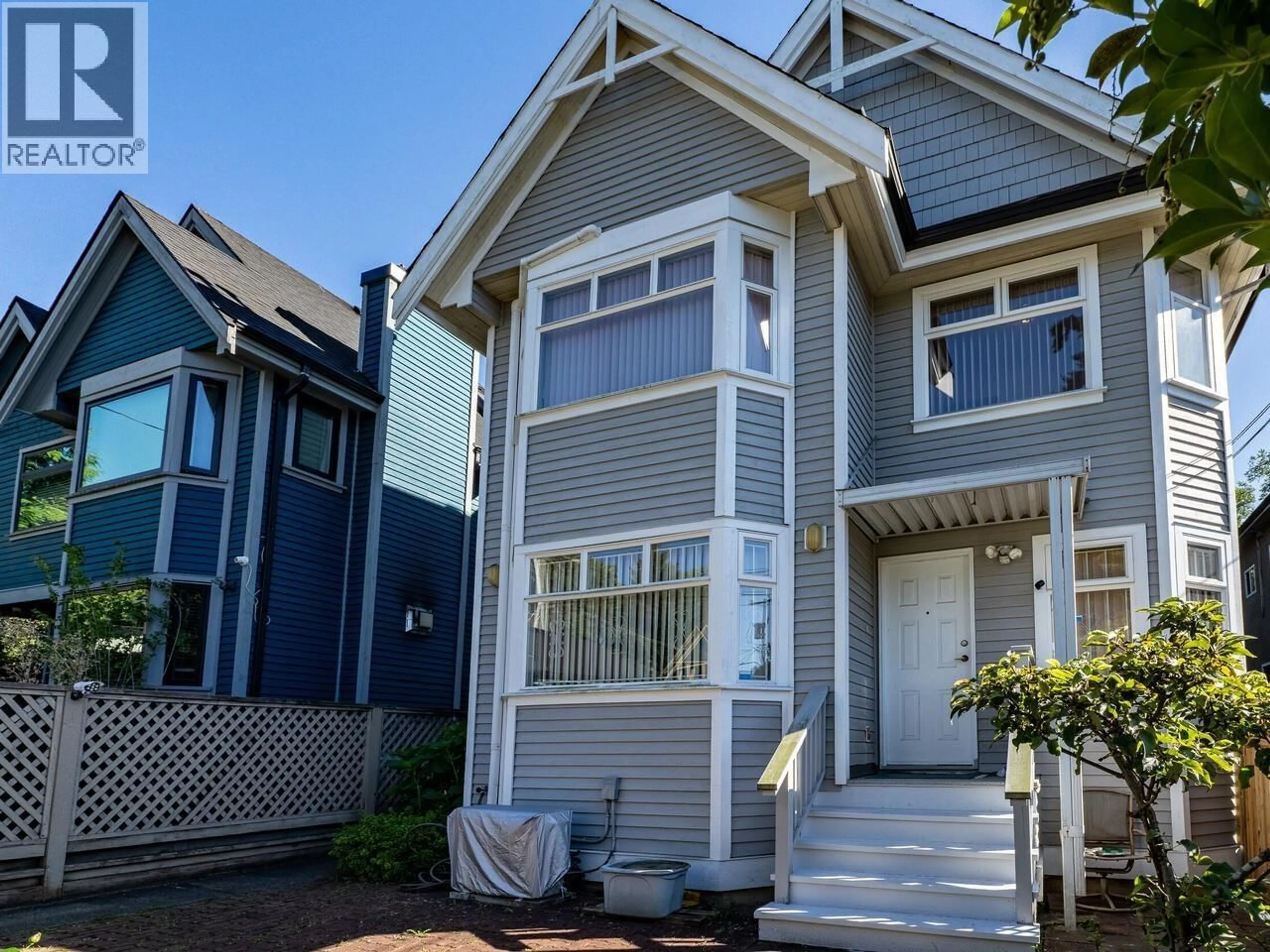 Home with vinyl exterior material, street for 39 12TH AVENUE, Vancouver British Columbia V5Y1T4