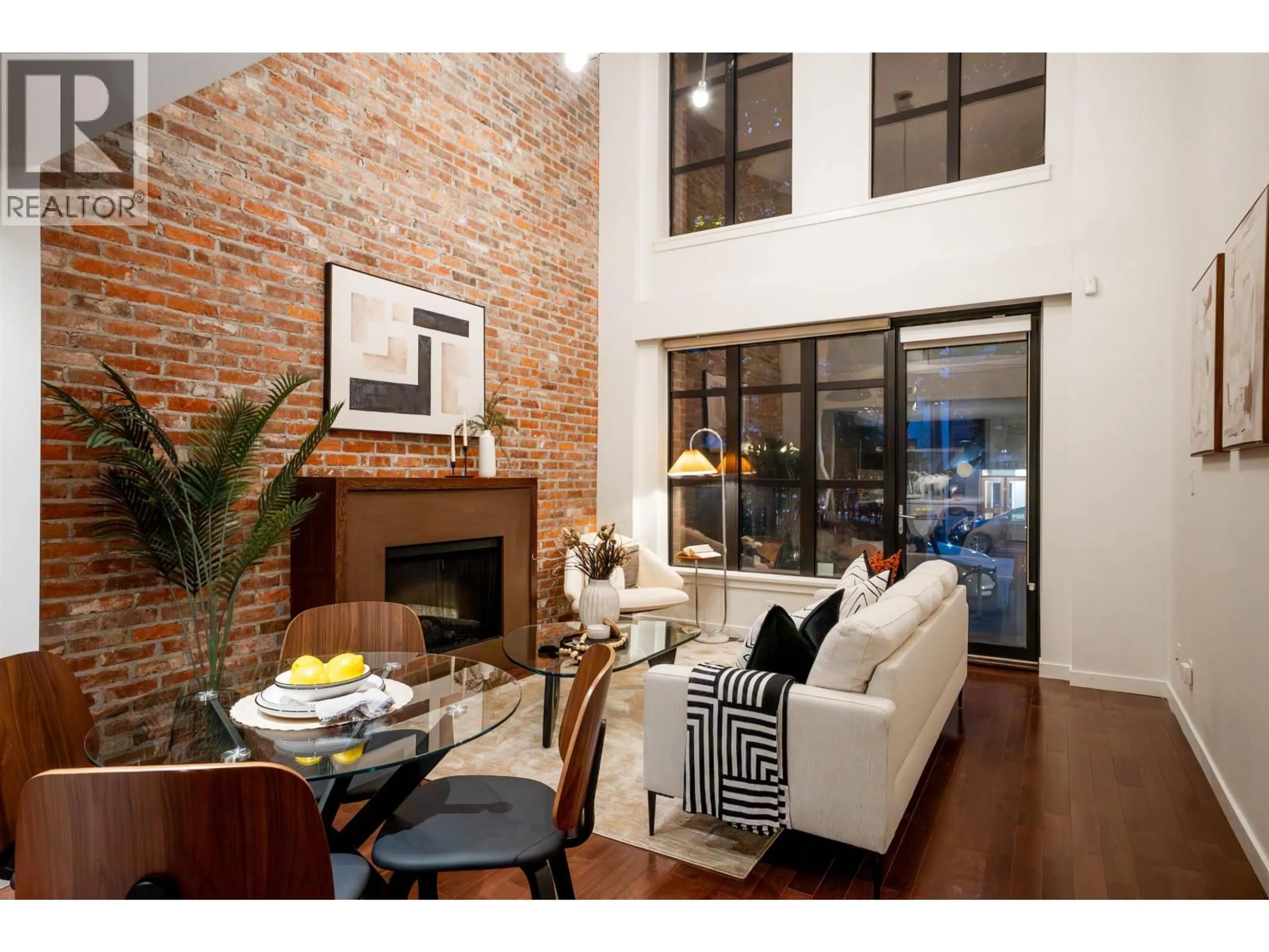 Living room with furniture, ceramic/tile floor for 104 - 1241 HOMER STREET, Vancouver British Columbia V6B2Y9