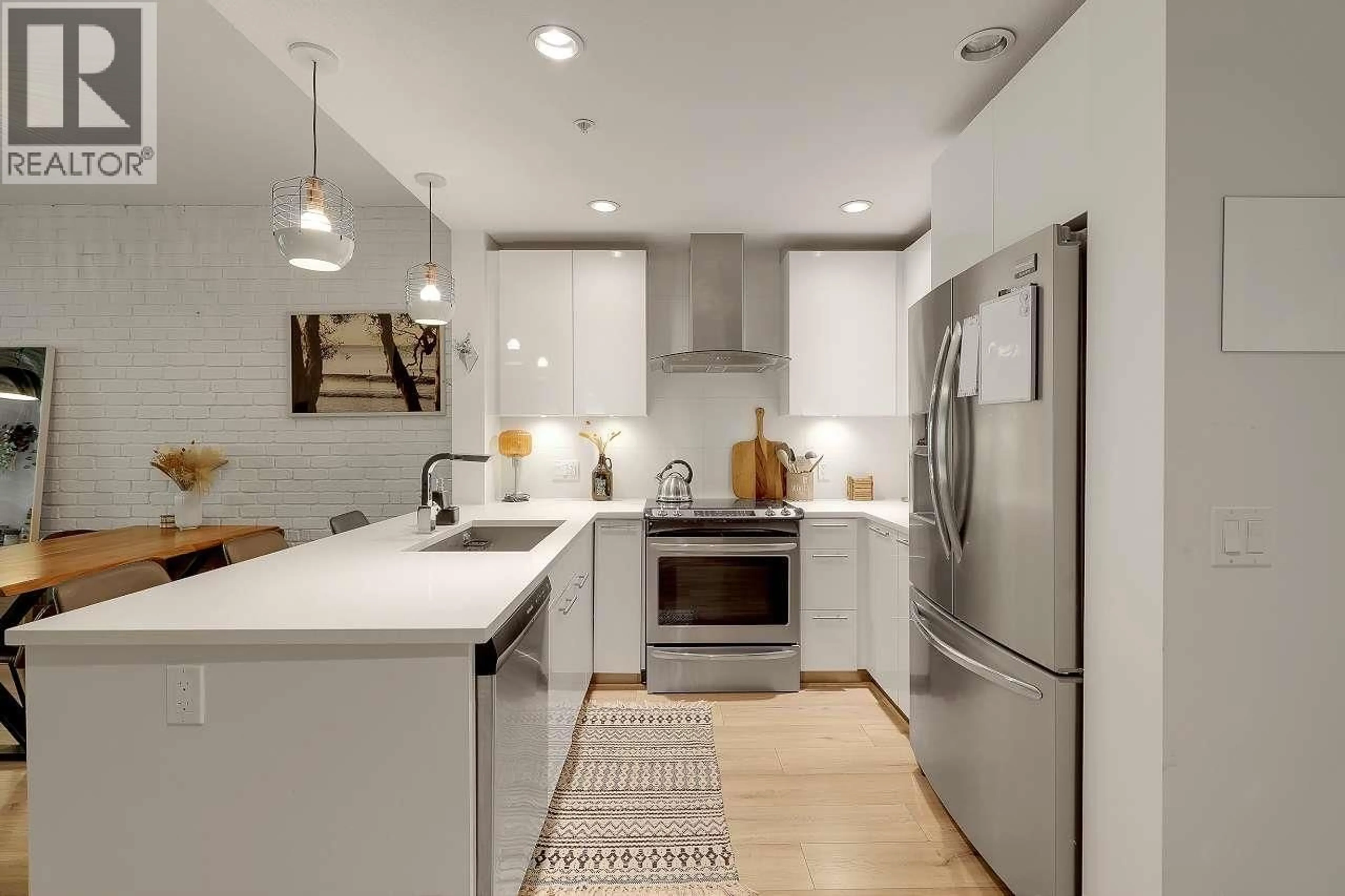 Contemporary kitchen, ceramic/tile floor for 302 - 733 3RD STREET, North Vancouver British Columbia V7M0C8