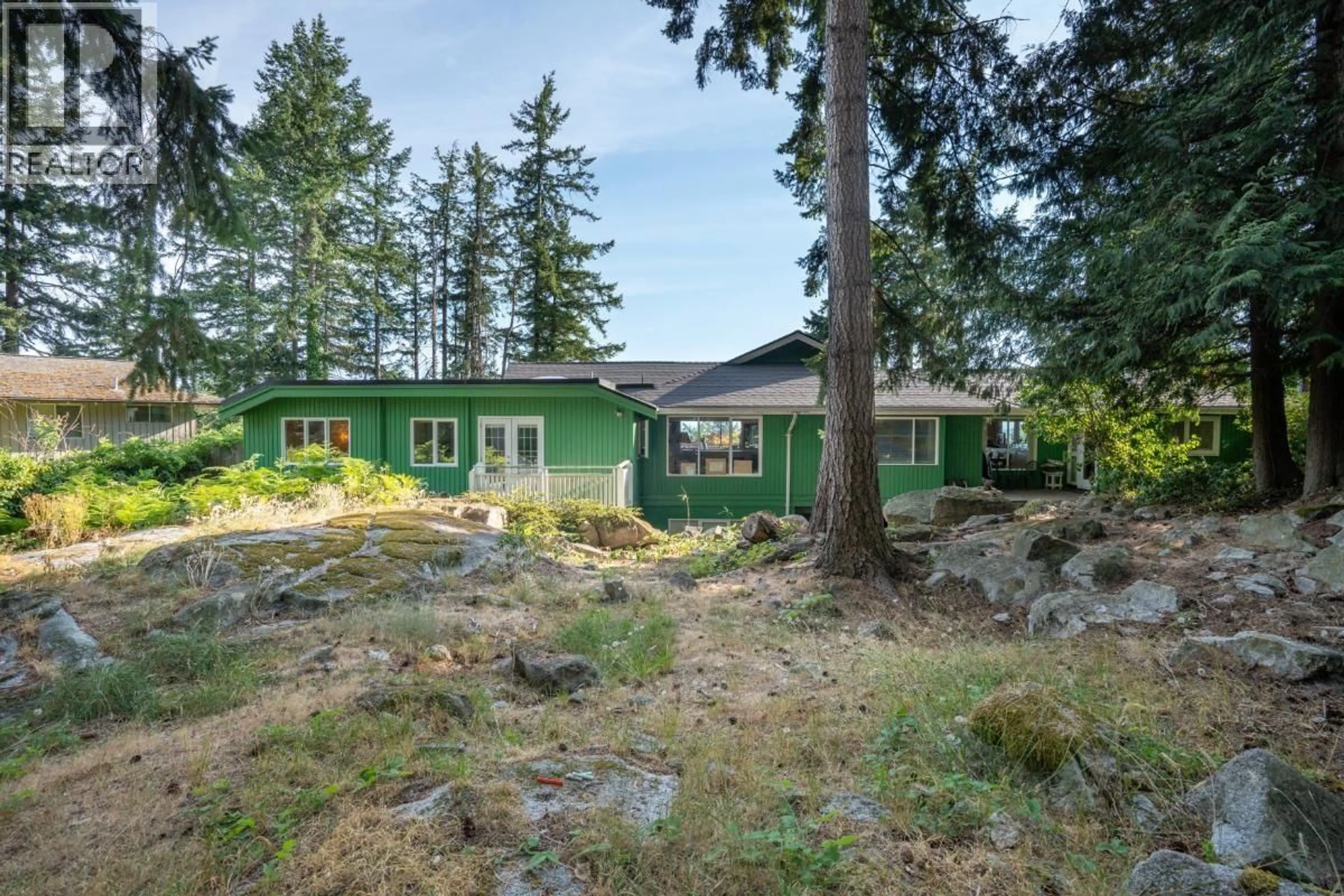 A pic from outside/outdoor area/front of a property/back of a property/a pic from drone, forest/trees view for 4415 WOODCREST ROAD, West Vancouver British Columbia V7S2W2