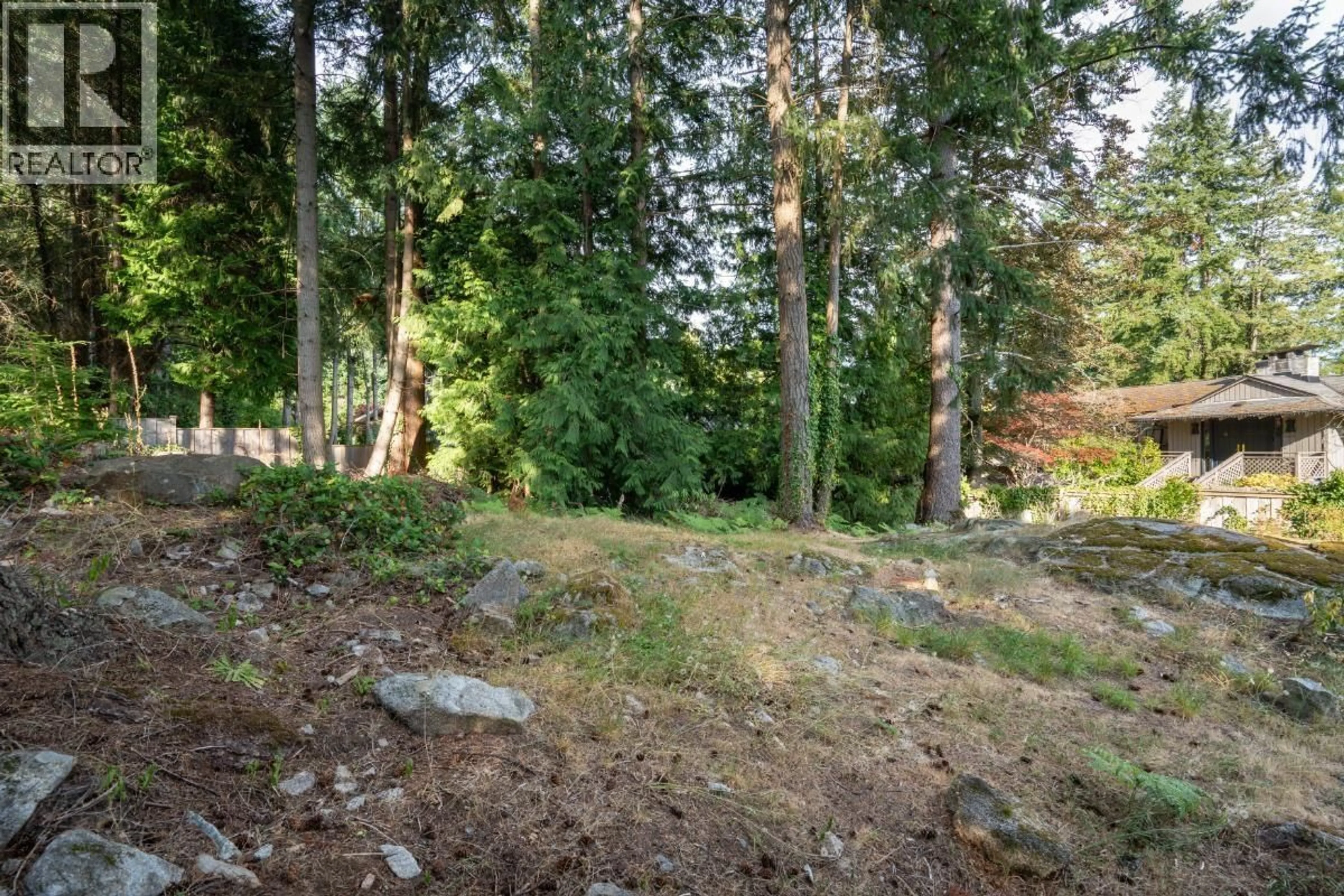A pic from outside/outdoor area/front of a property/back of a property/a pic from drone, forest/trees view for 4415 WOODCREST ROAD, West Vancouver British Columbia V7S2W2