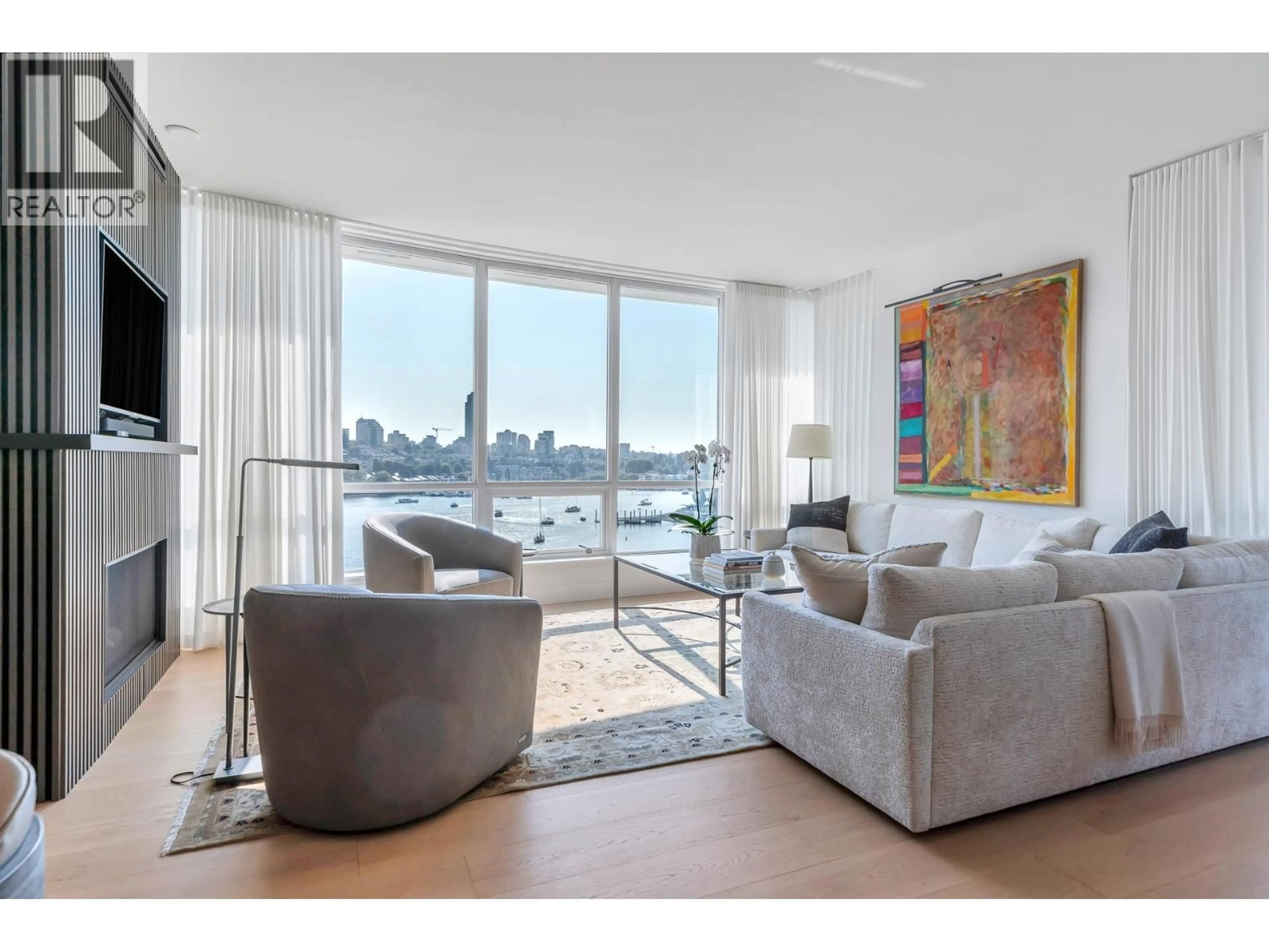 Living room with furniture, unknown for 801 - 1328 MARINASIDE CRESCENT, Vancouver British Columbia V6Z3B3