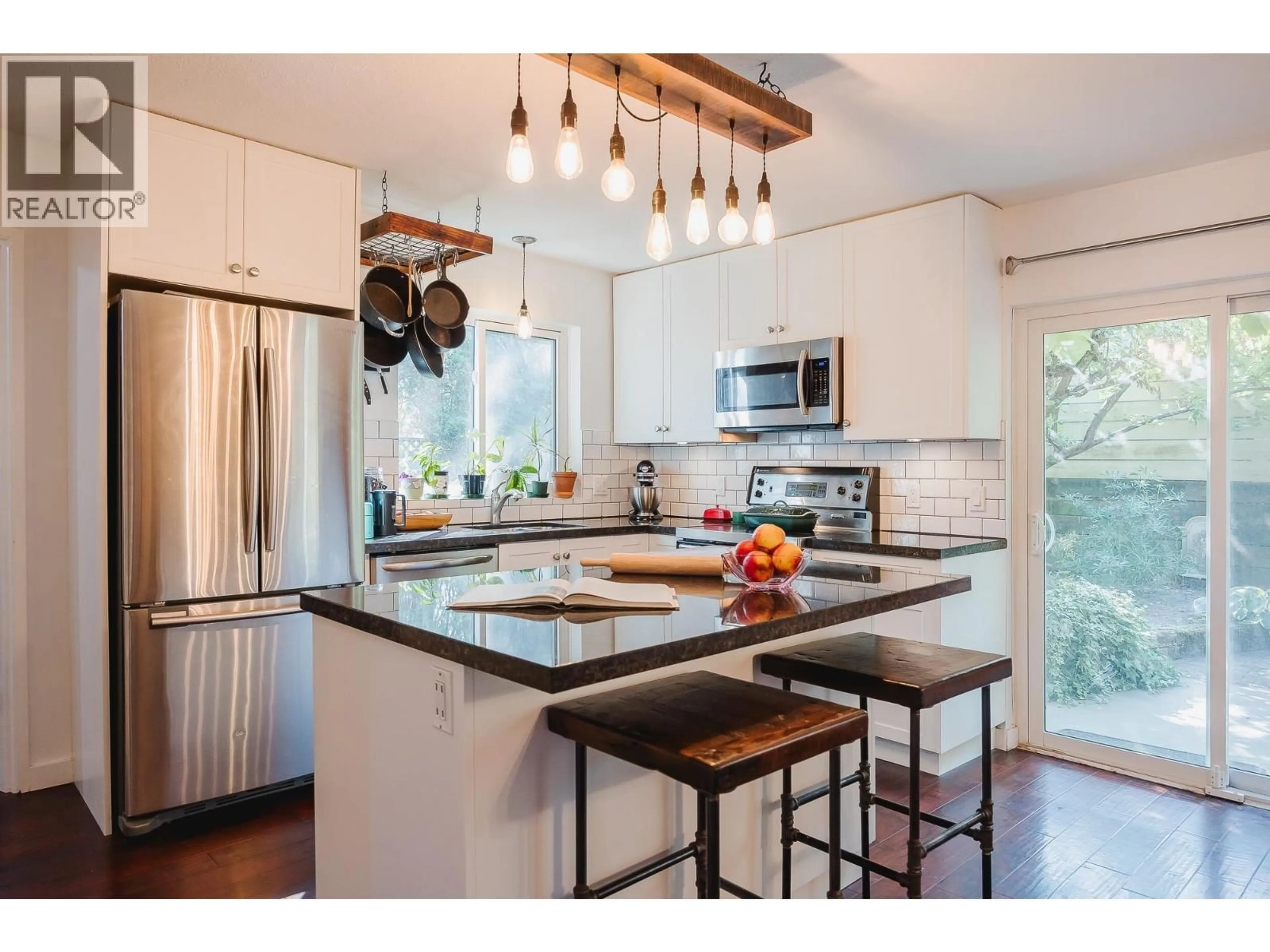 Open concept kitchen, wood/laminate floor for 37 - 6245 SHERIDAN ROAD, Richmond British Columbia V7E4W6